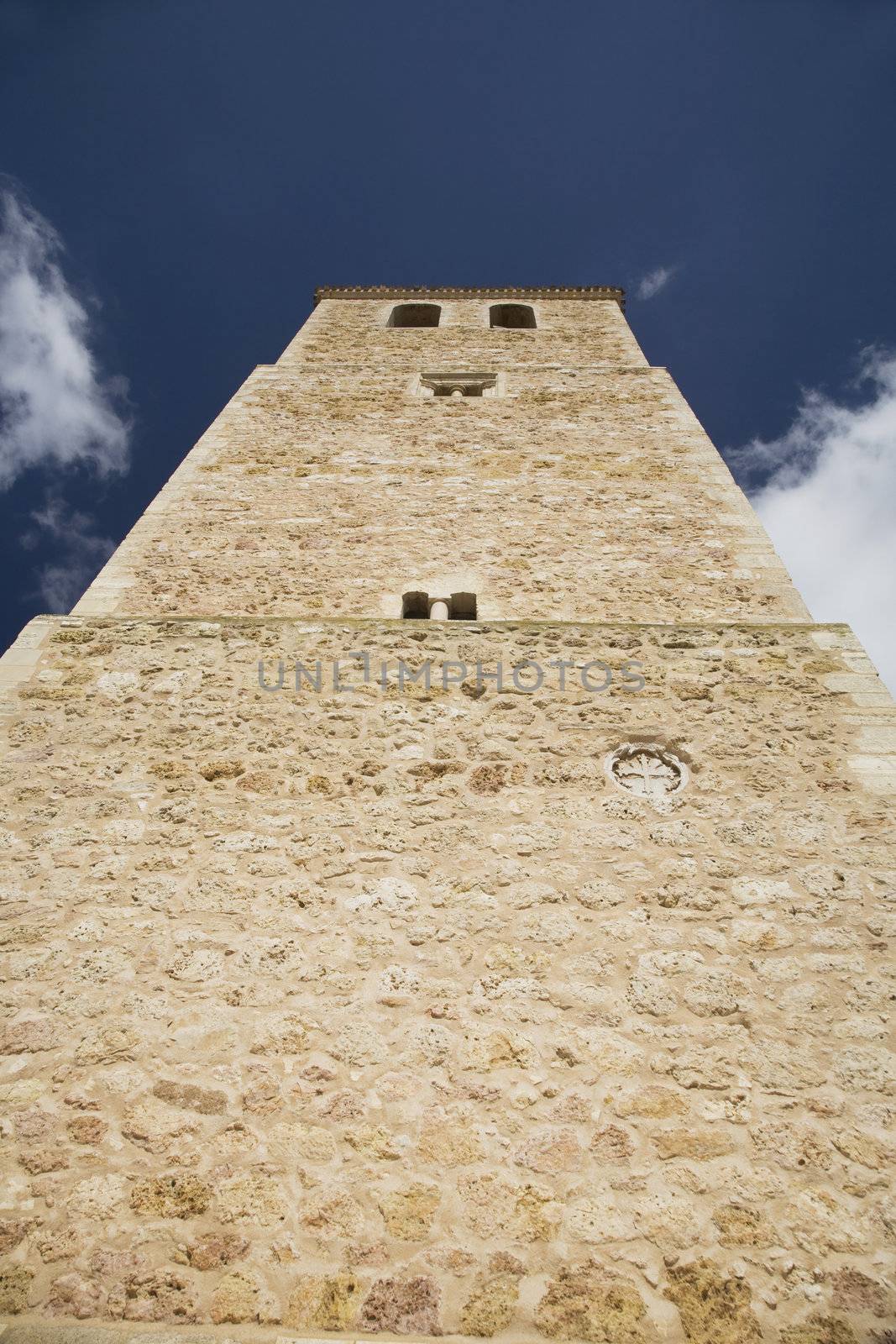 tower of the church at belmonte village in spain