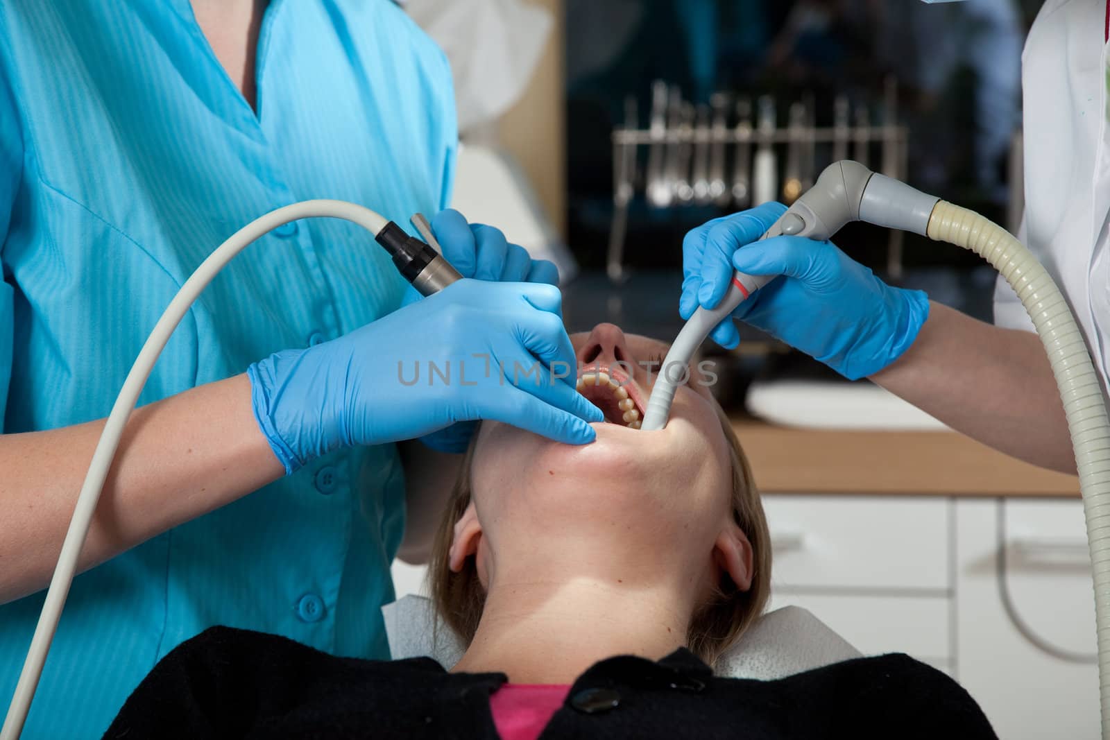 Female patient being treated in the dental clinic