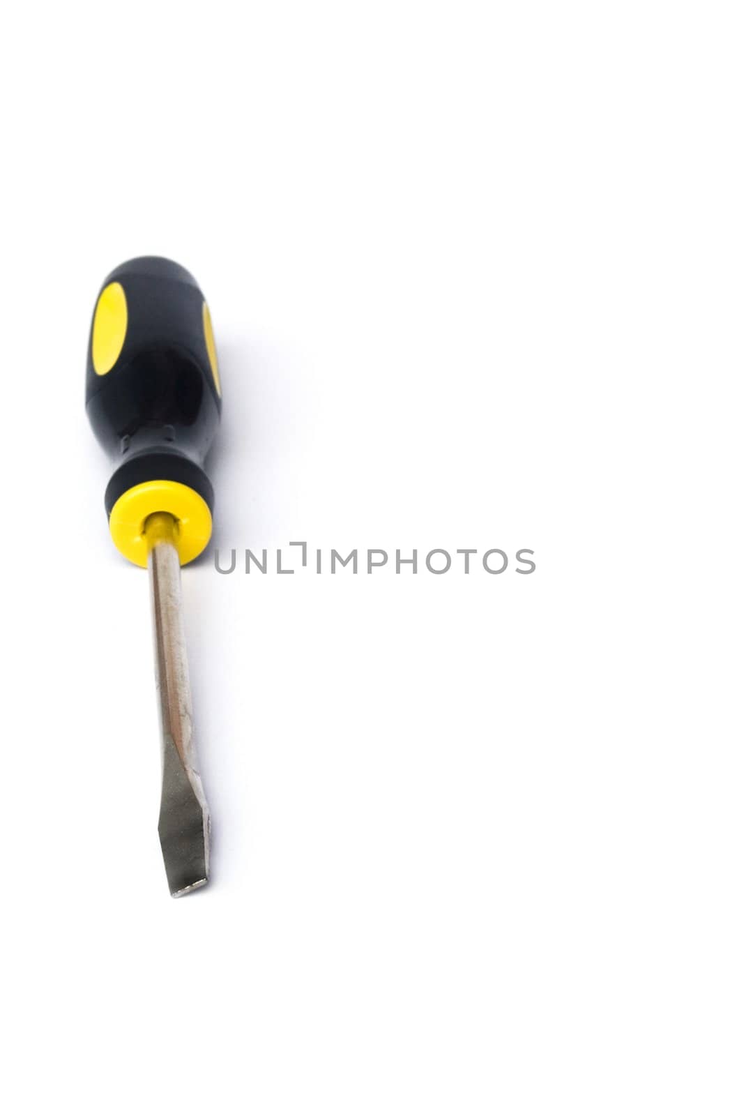 Yellow and black handled screwdriver on white background