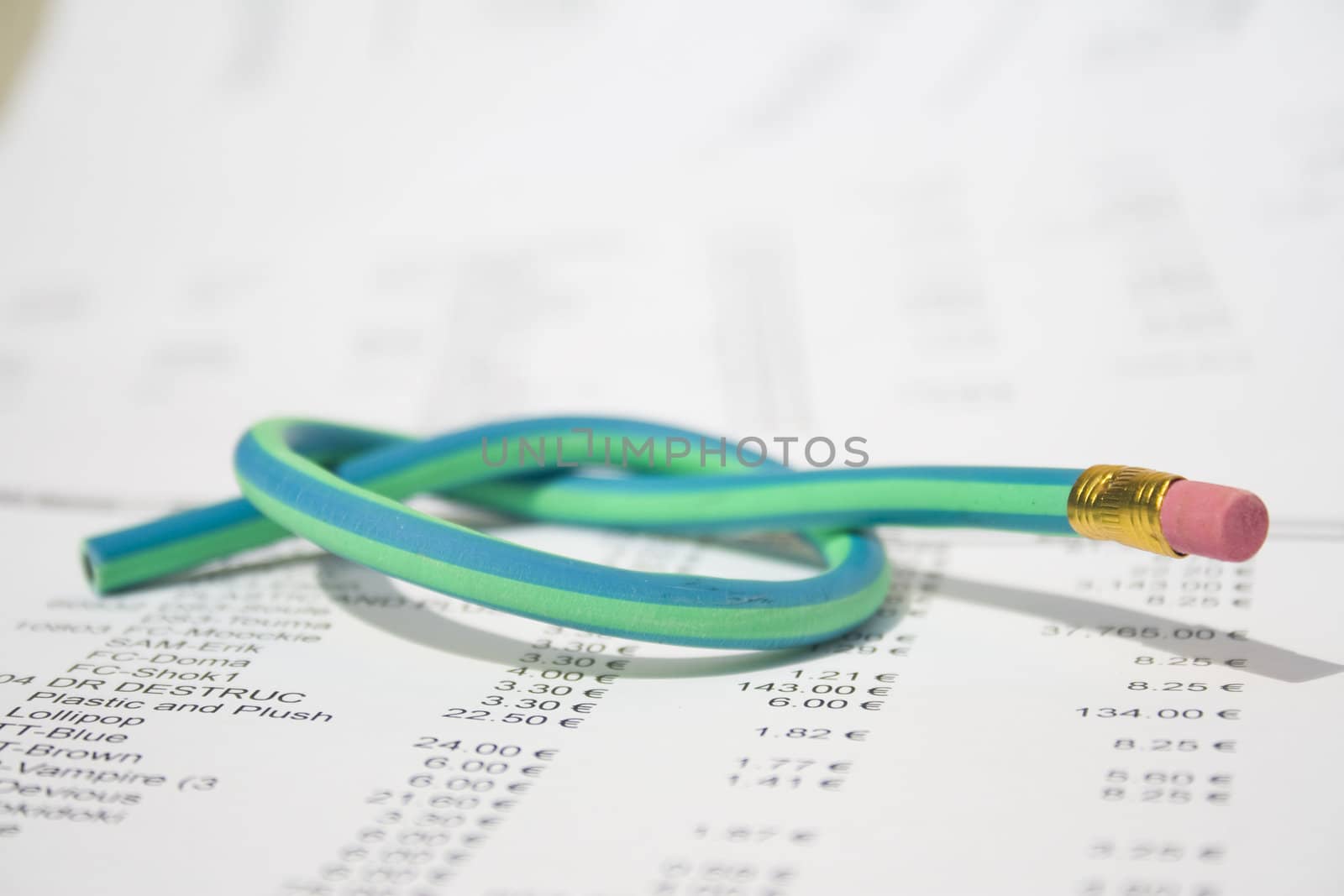 Green rubber pencil twisted into a knot by timscottrom