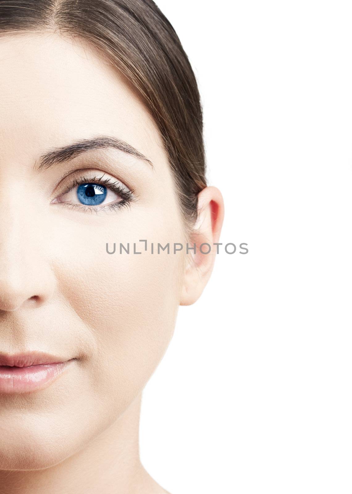 Close-up portrait of a beautiful woman with blue eyes