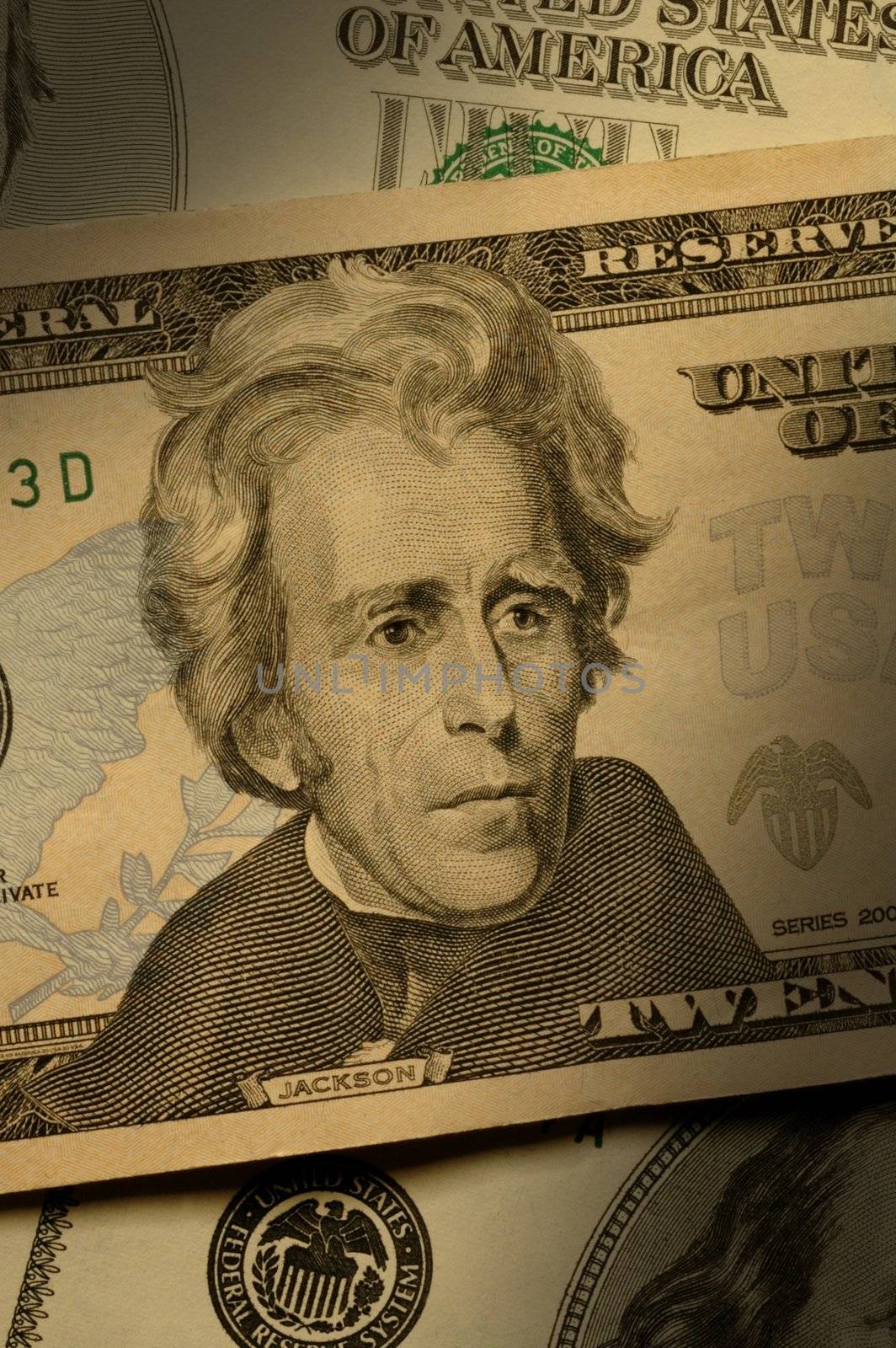 Close-up of Andrew Jackson on the $20 bill, dramatically lit.