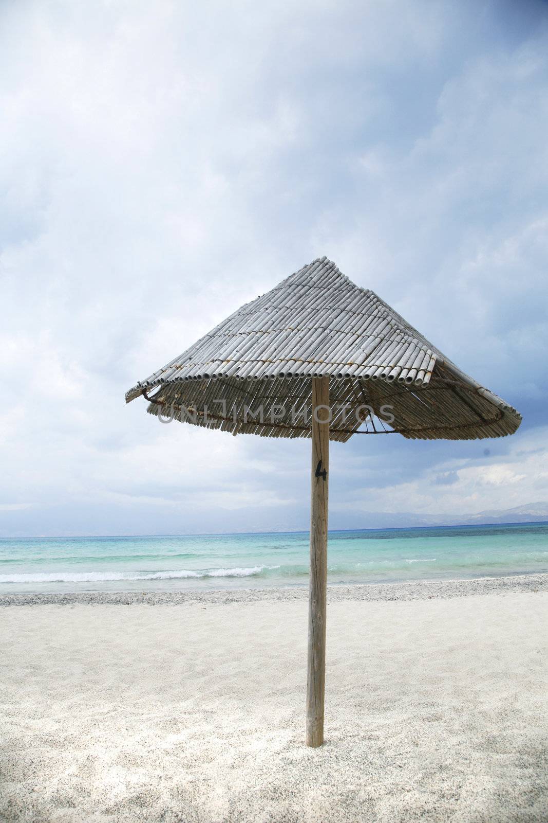 lonely parasol at christi island near crete