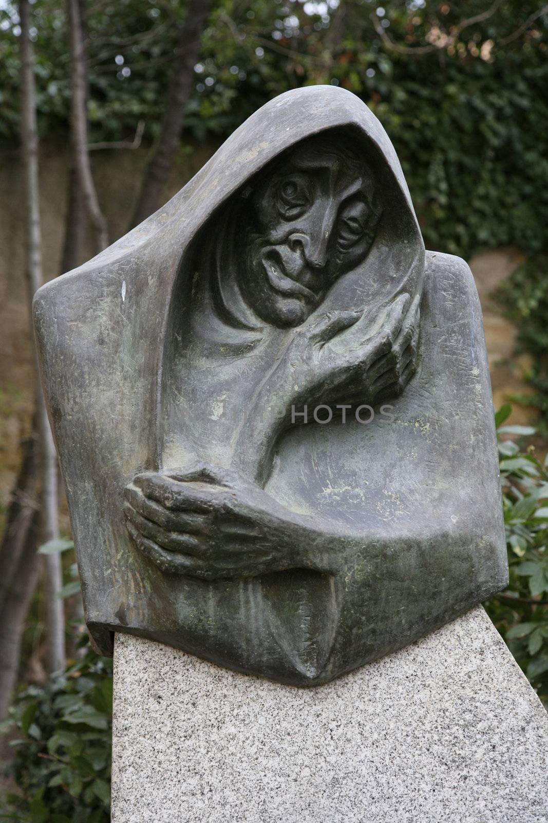 front view of witch sculpture