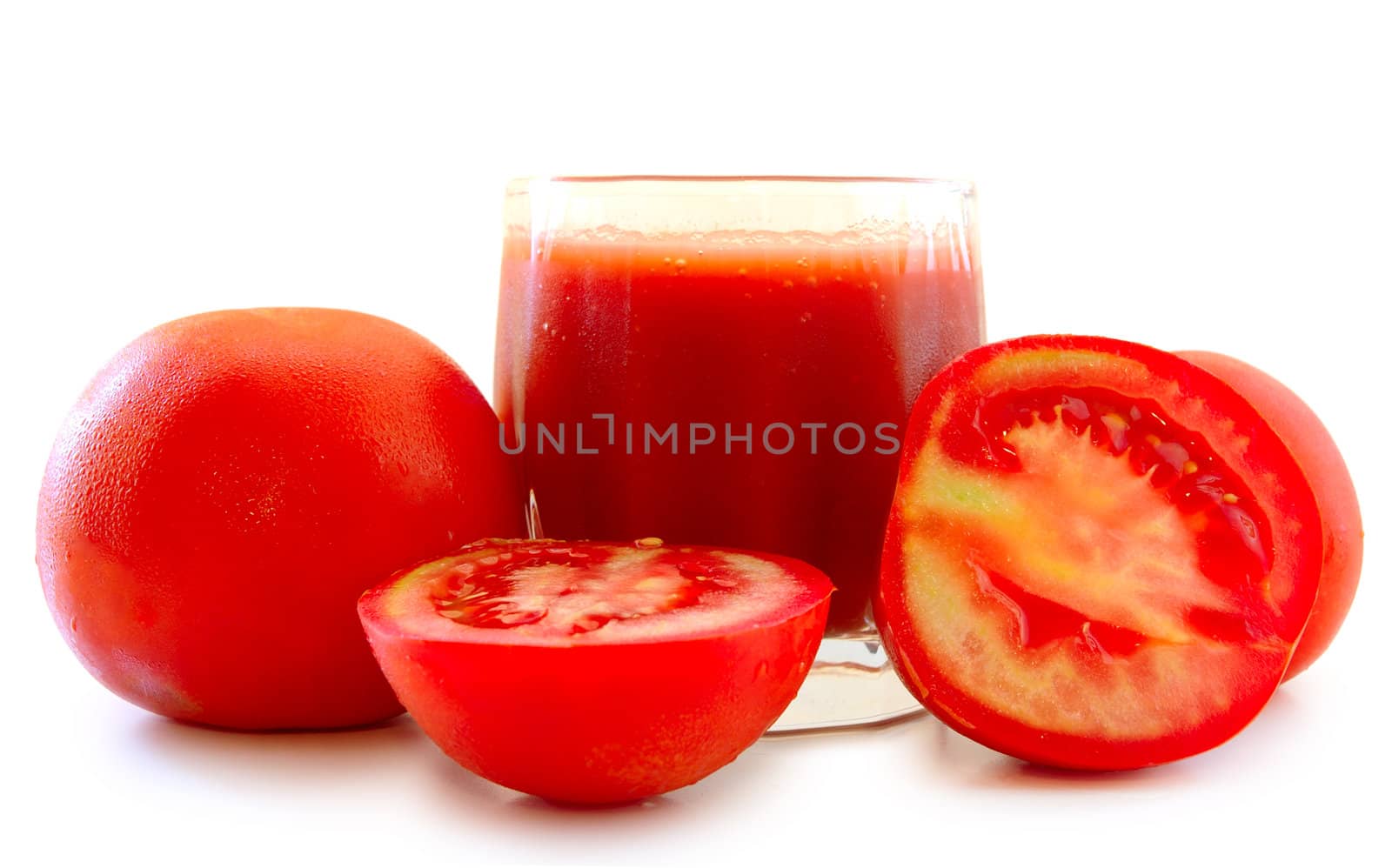 Fresh tomato juice and tomatoes on isolated background.