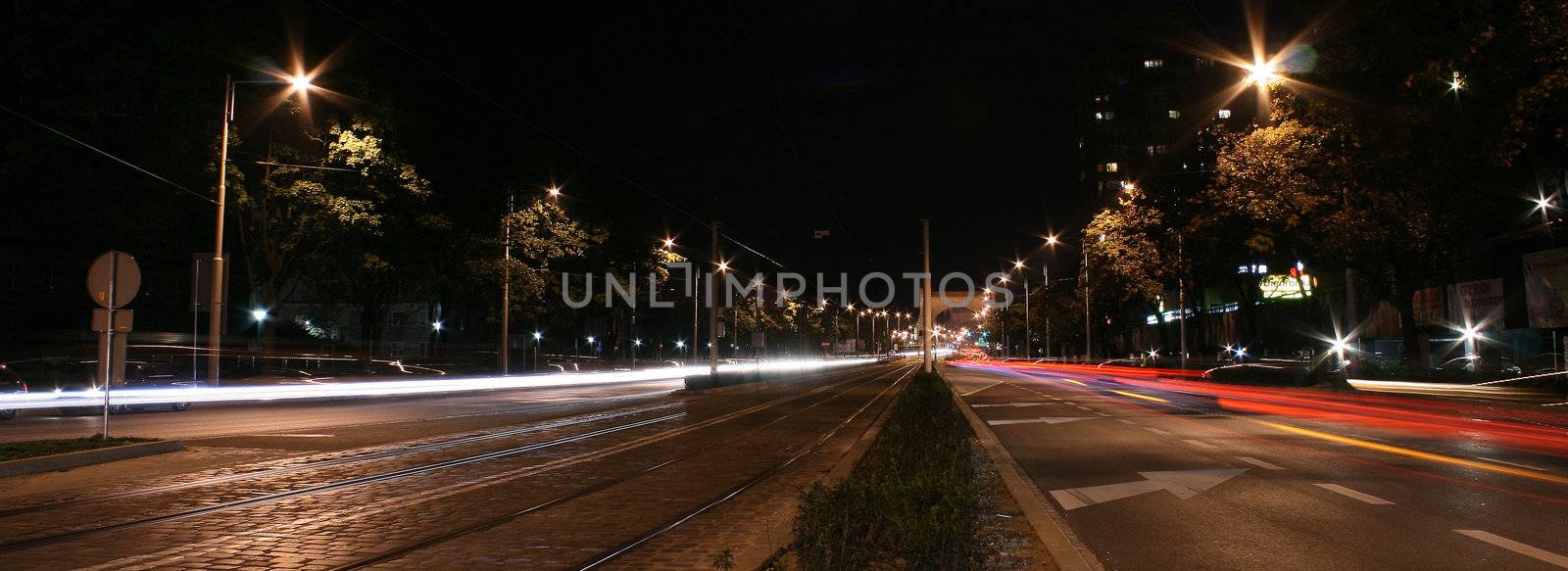 traffic at night, main street in Wroclaw, Poland