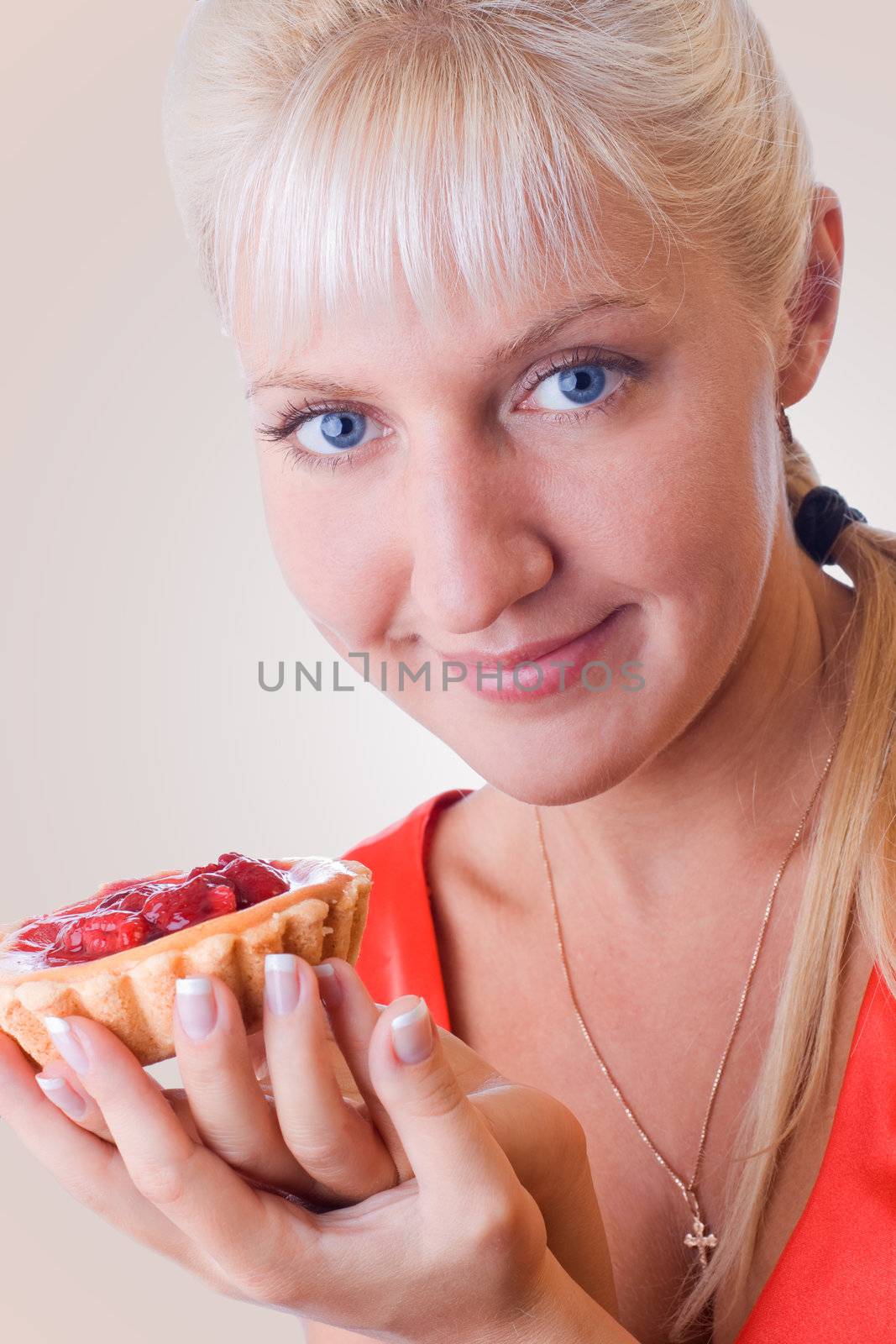 Woman in red posing with cherry cheese-cake. #1