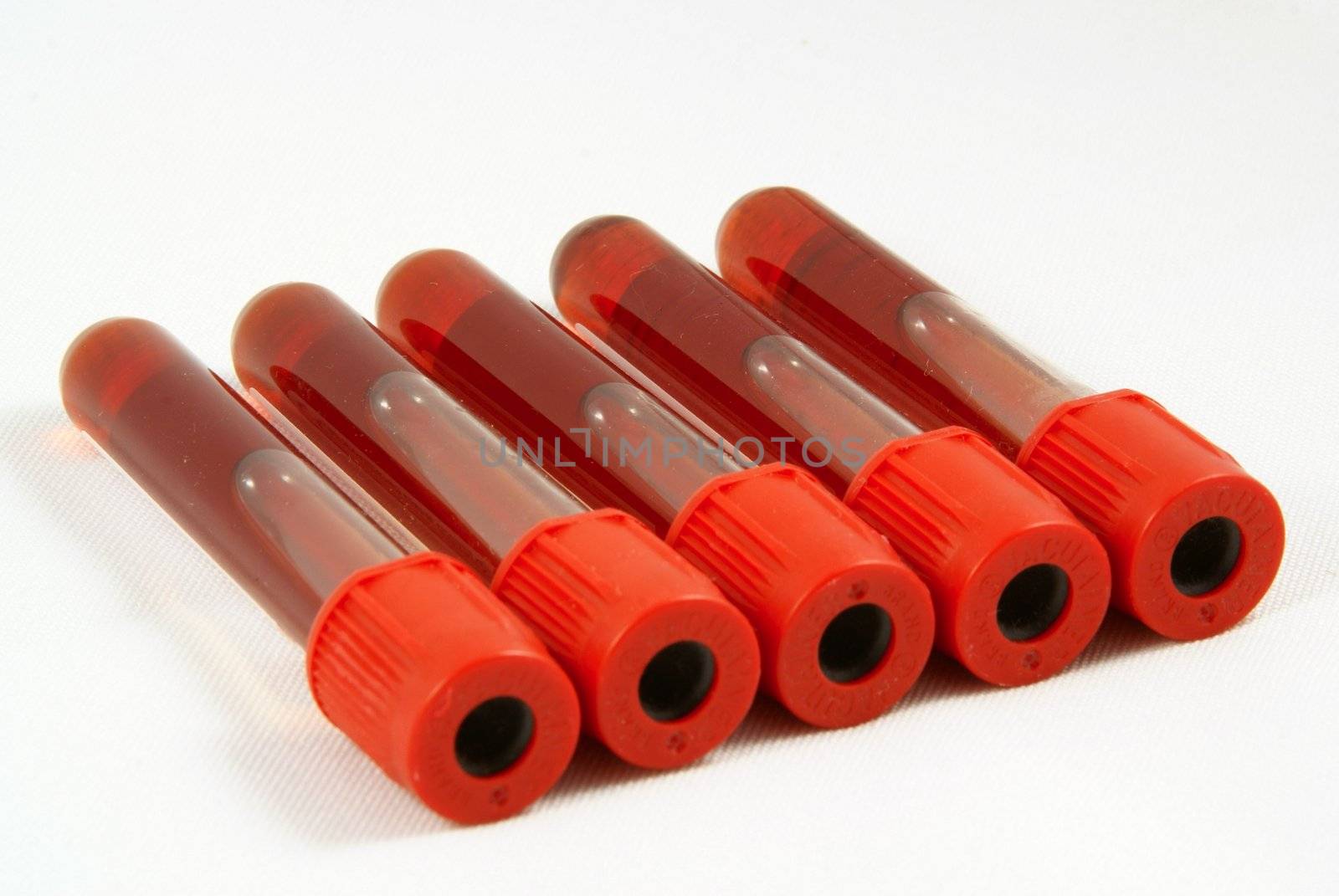 Test tubes with blood, white background by pmisak