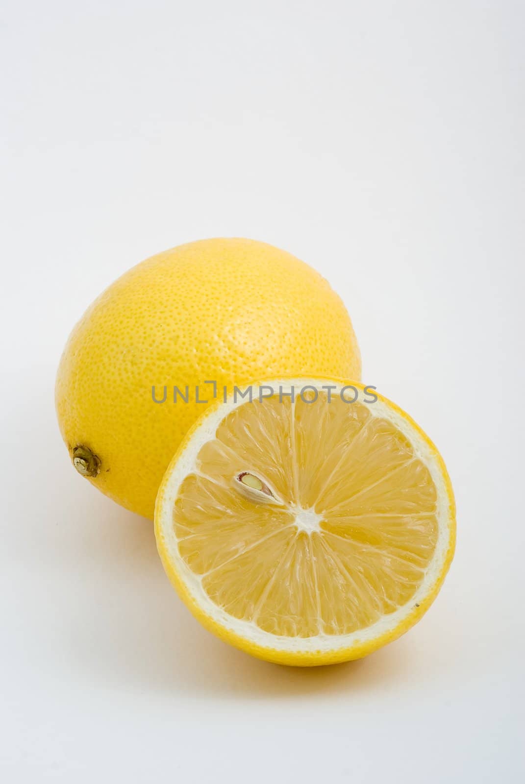 Fresh yellow lemons, isolated, white background