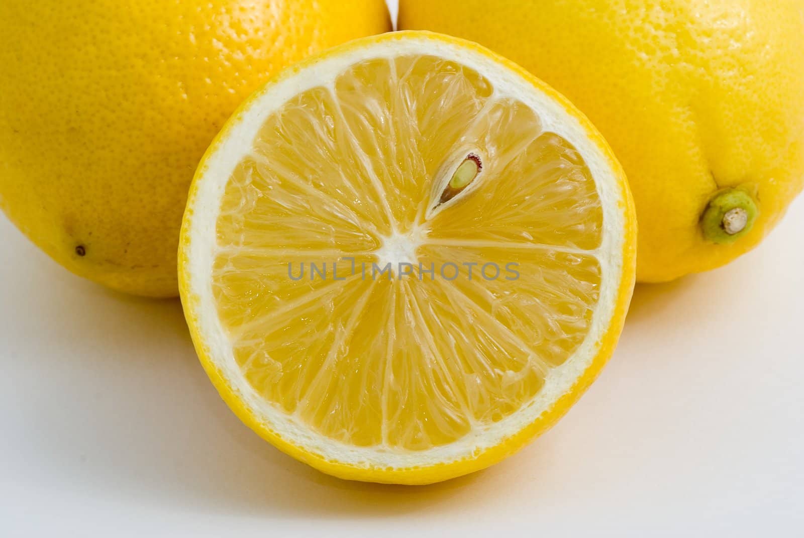 Fresh yellow lemons, isolated, white background