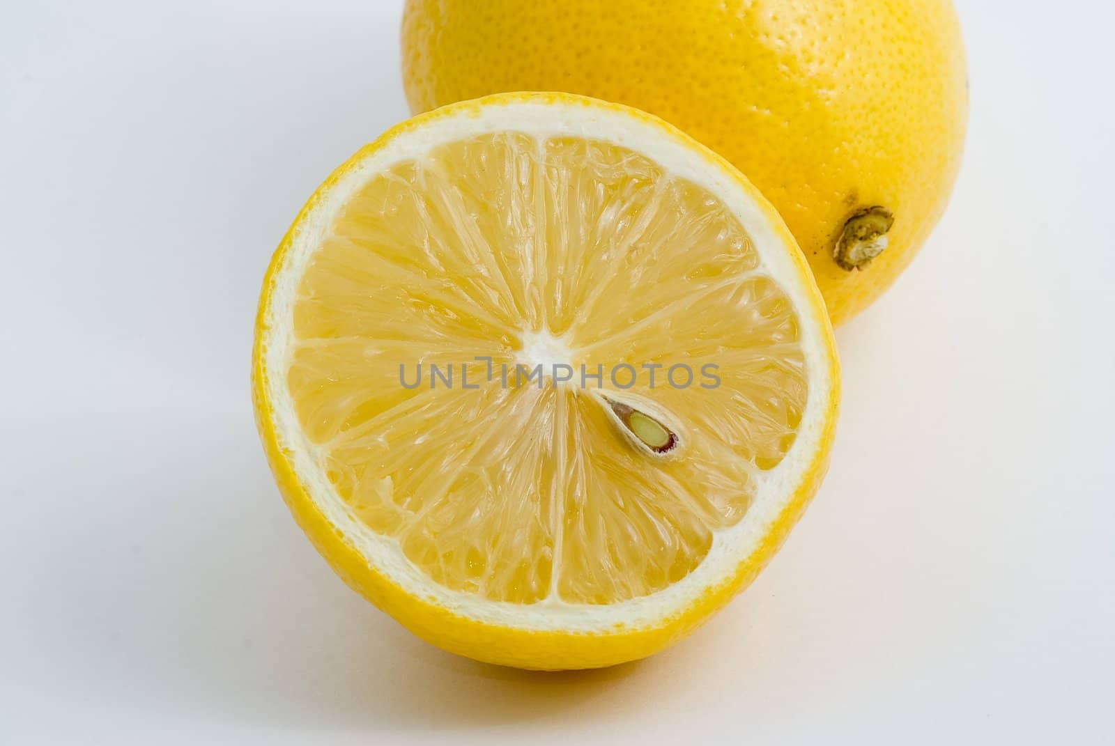 Fresh yellow lemons, isolated, white background