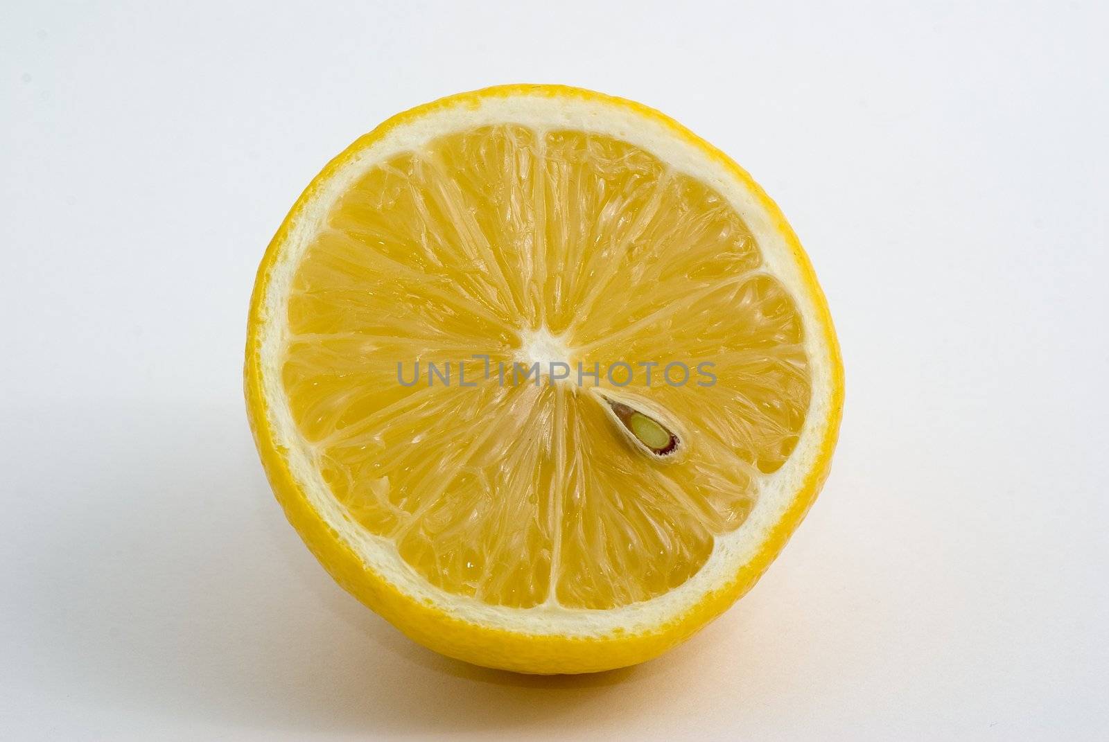 Fresh yellow lemon, white background