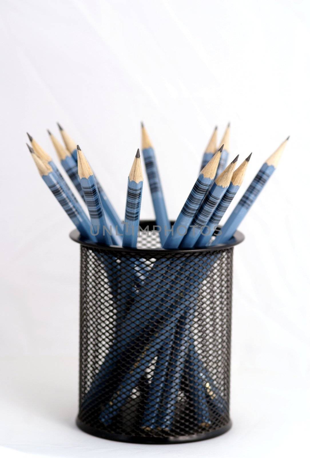 Wooden pens on pen holder by pmisak