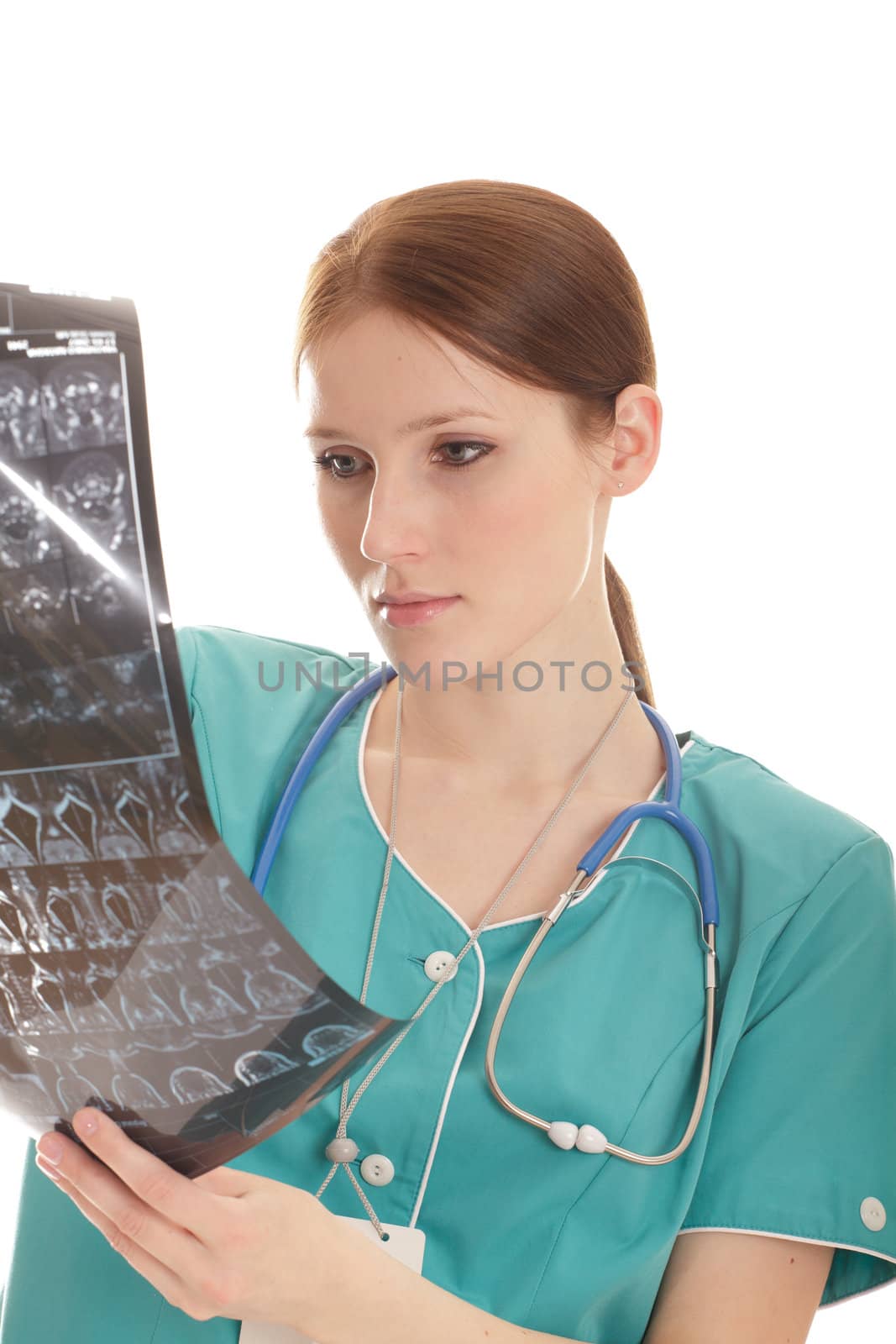 Female doctor looking at the xray picture by Nobilior