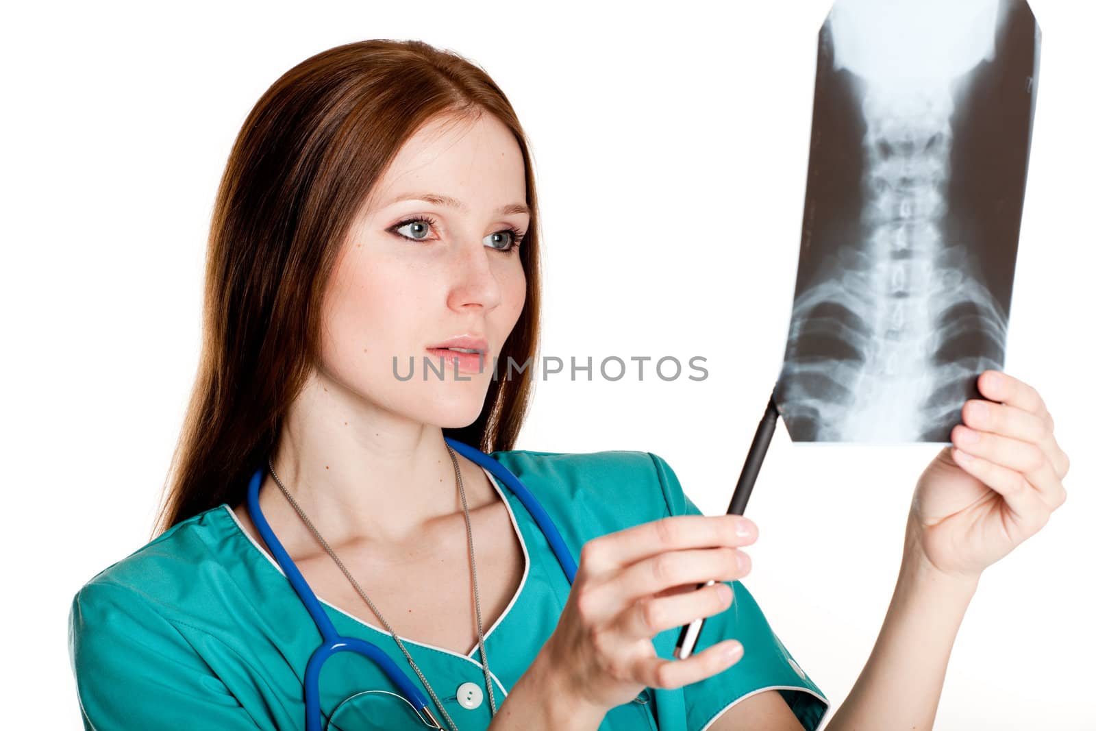 Female doctor looking at xray picture by Nobilior