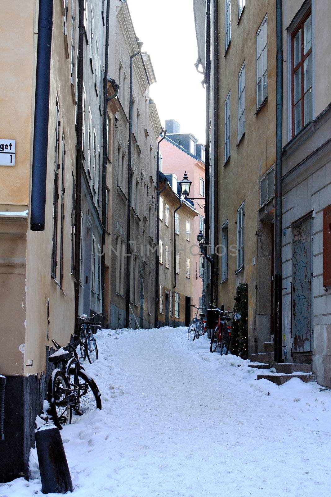 Winter street in old Stockholm by Kinst