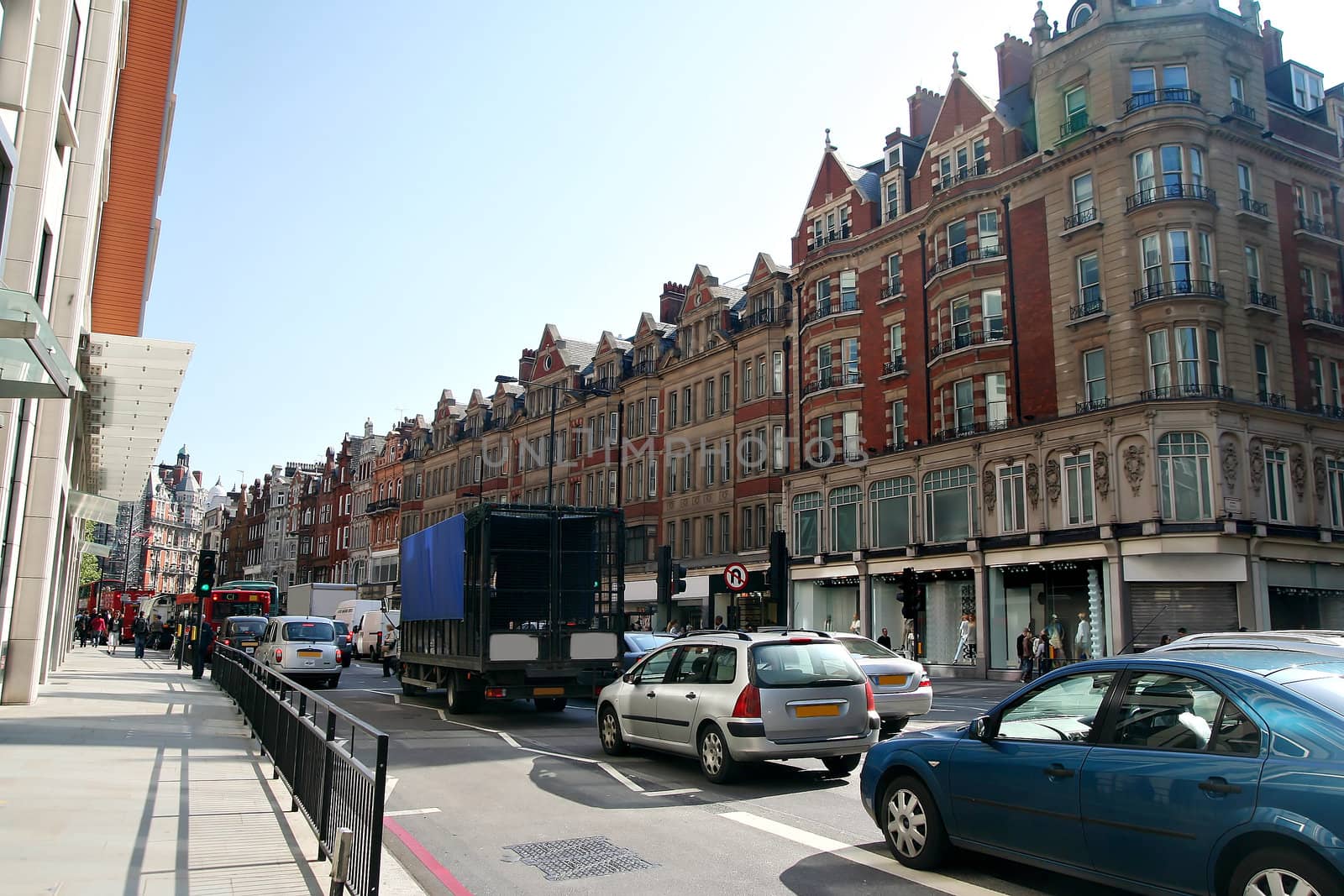 Heavy traffic at shiny day in London, Brampton road