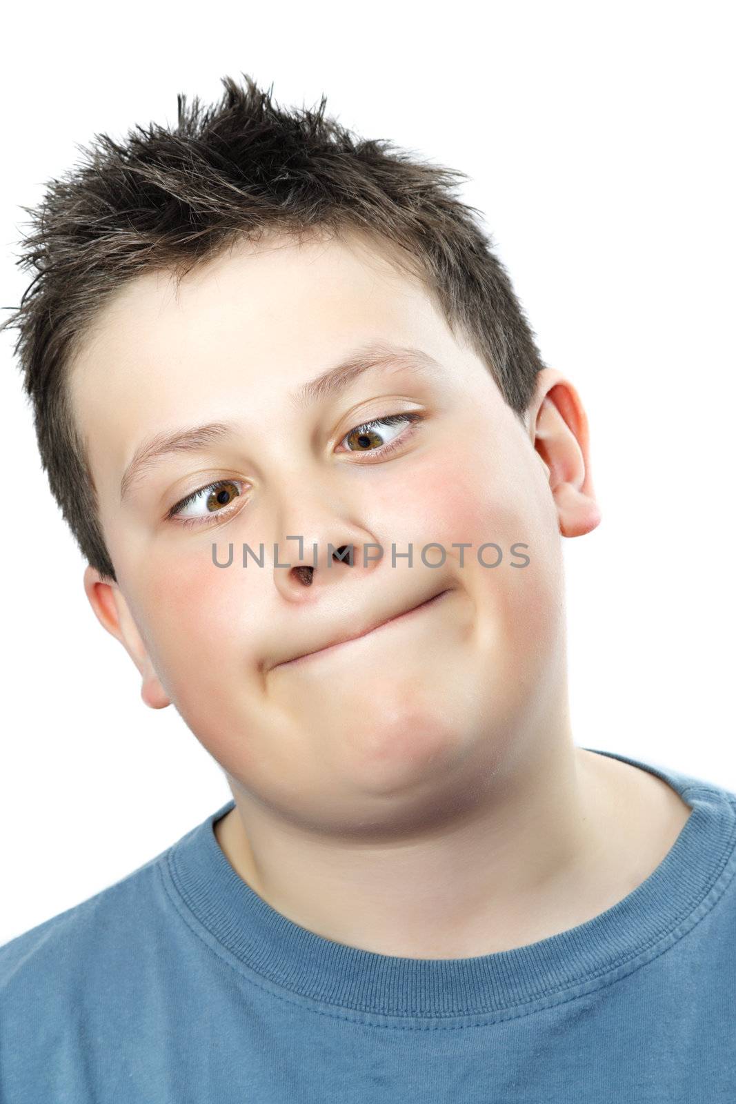 closeup portrait of a young teen boy doing funny face