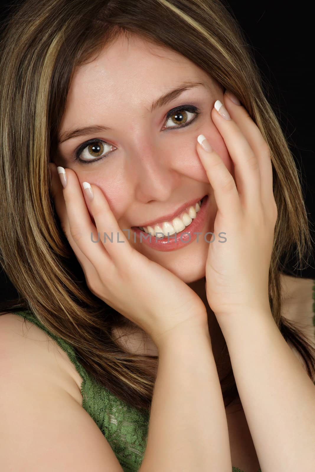 closeup portrait of a woman with hand on her face