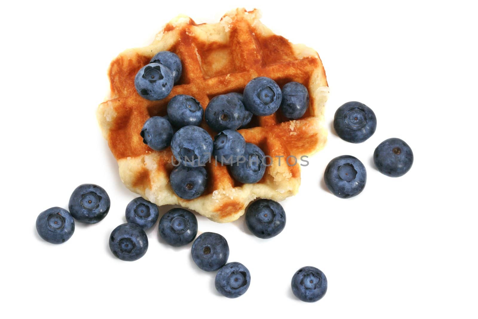 Belgian waffles with fresh blueberries, isolated on white
