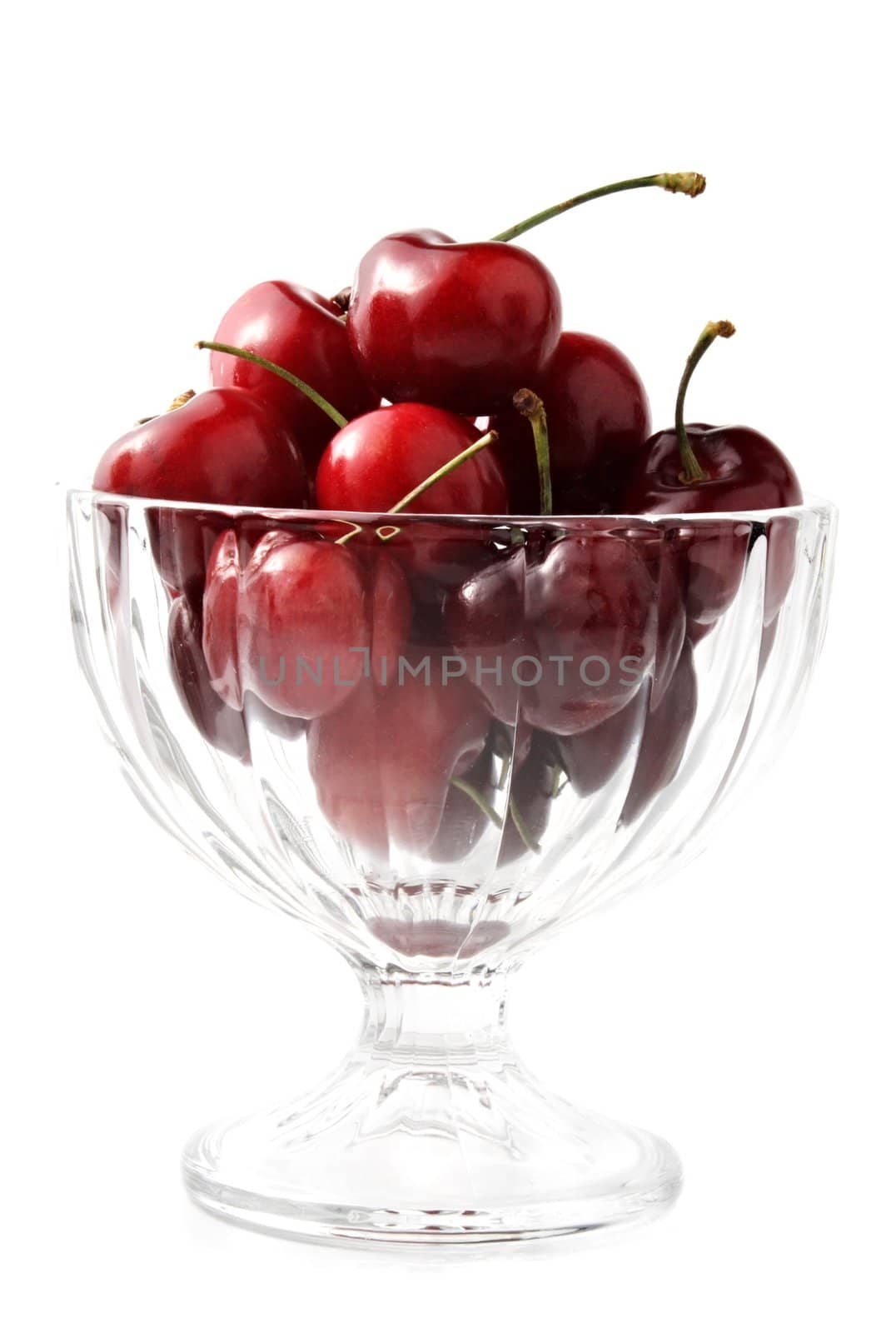 cherries in a glass bowl by lanalanglois