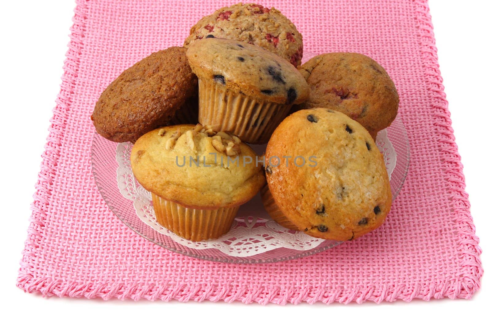 plate of muffins, pink tablecloth