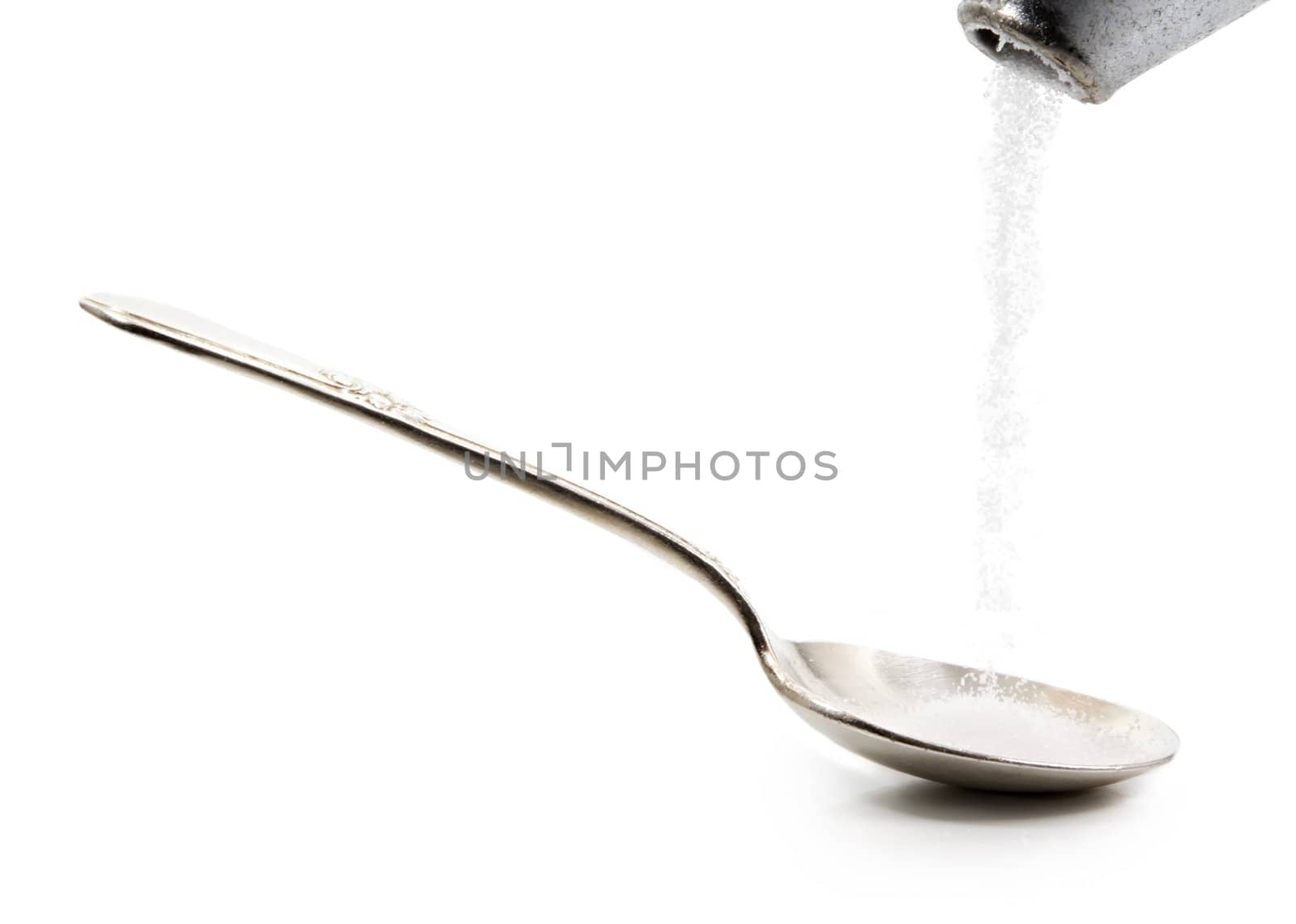 pouring sugar in spoon by lanalanglois
