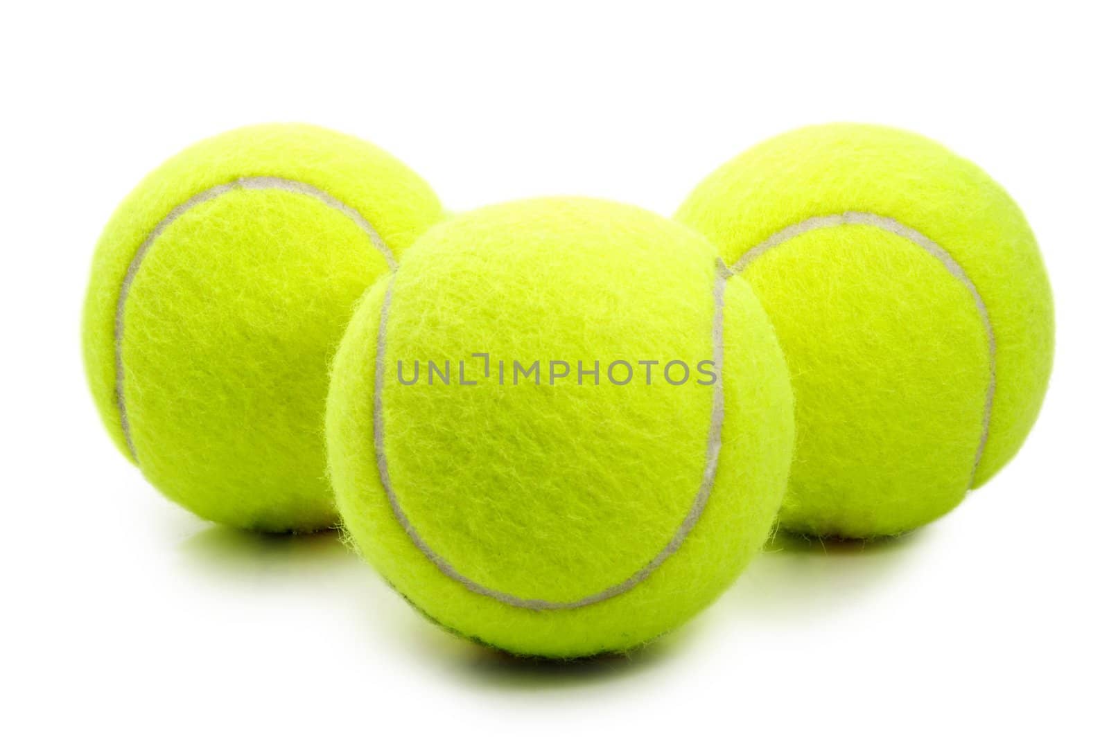 three yellow tennis ball