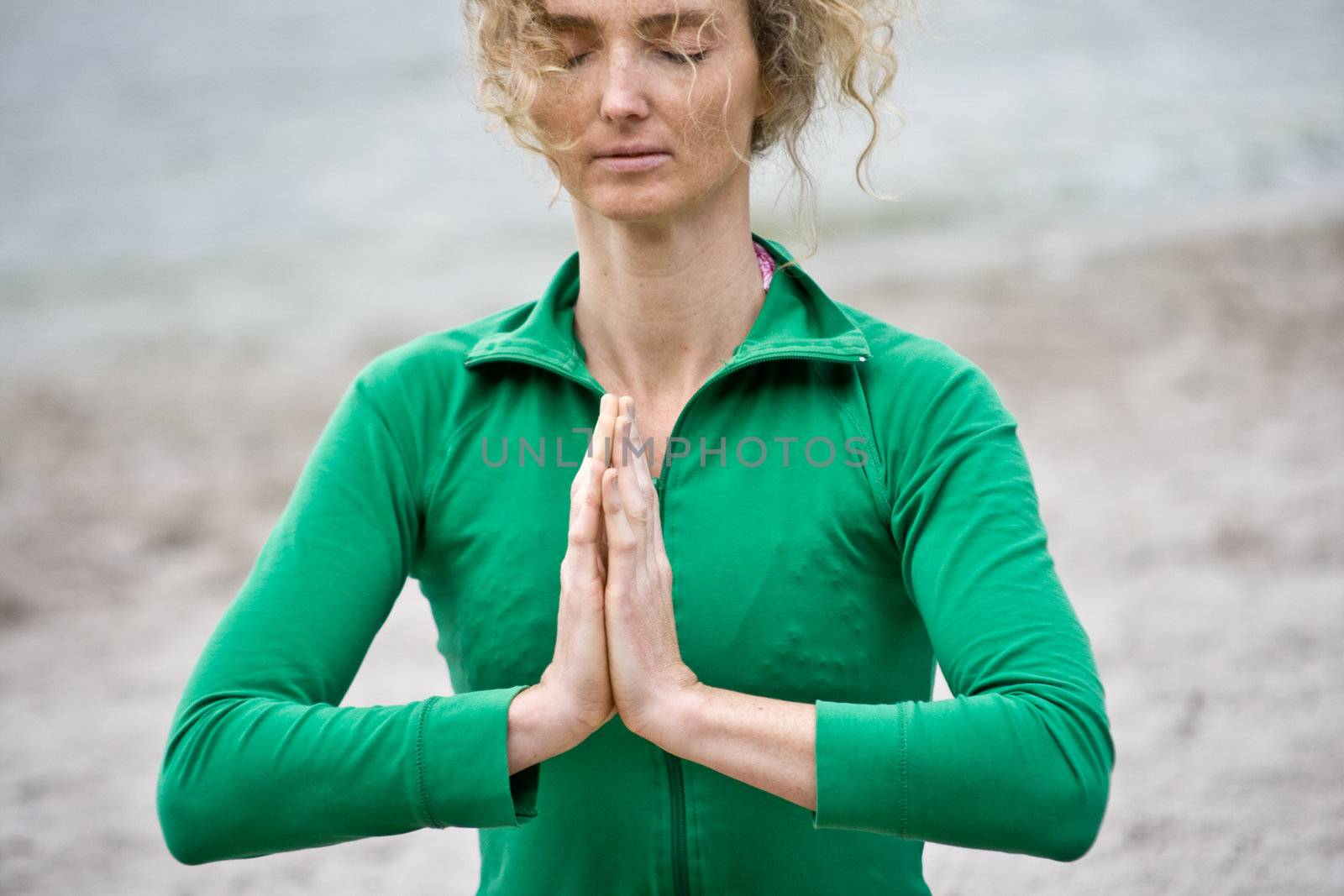 Meditation Of A Mature Blond Woman Near Water