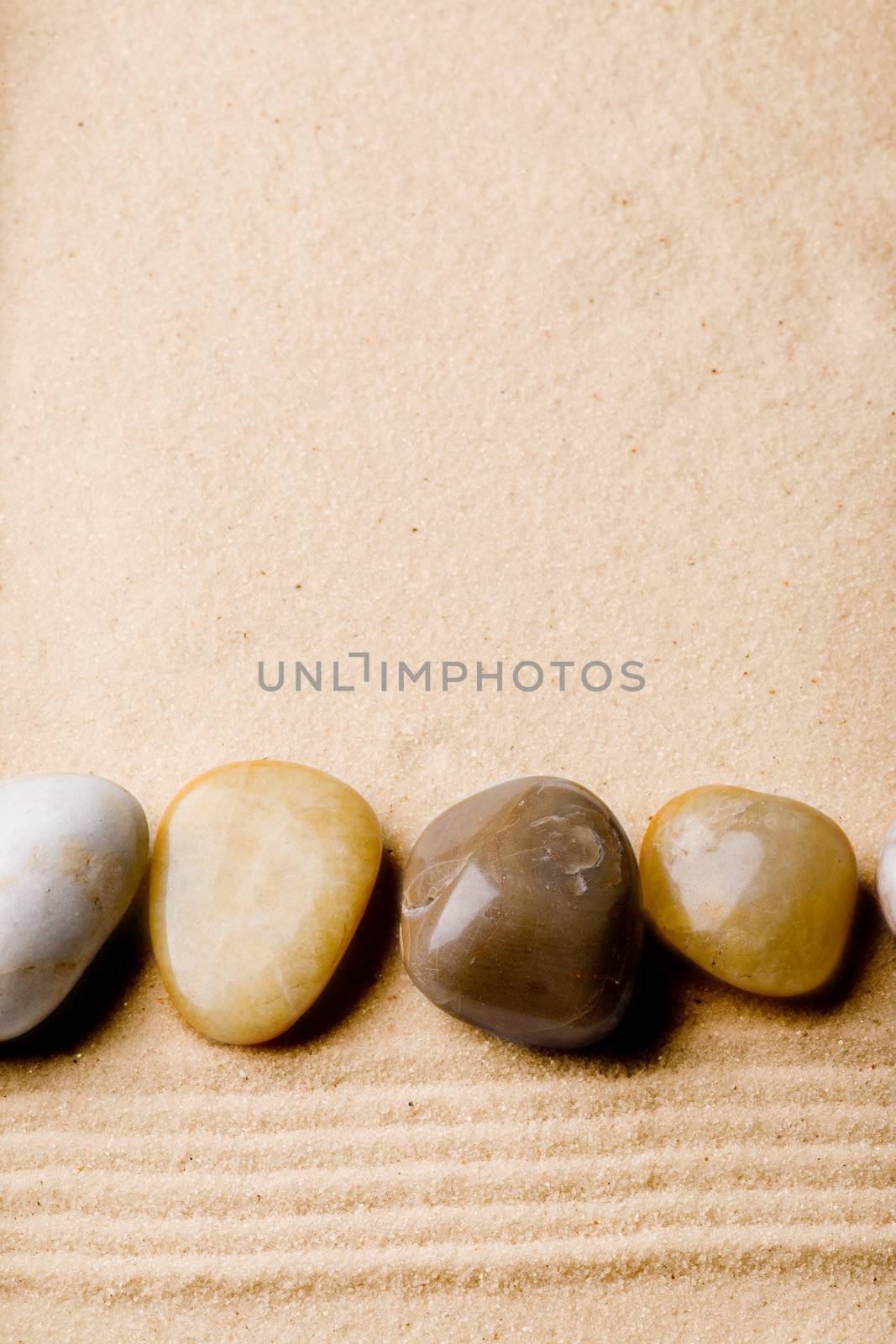 A sand beach abstract background with rocks