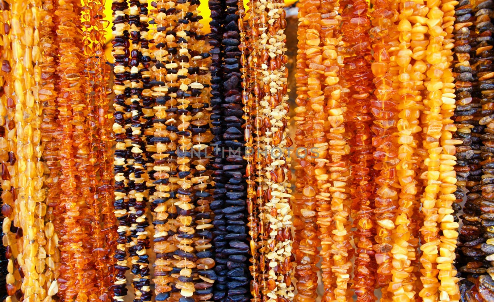 Background with beautiful necklets with amber