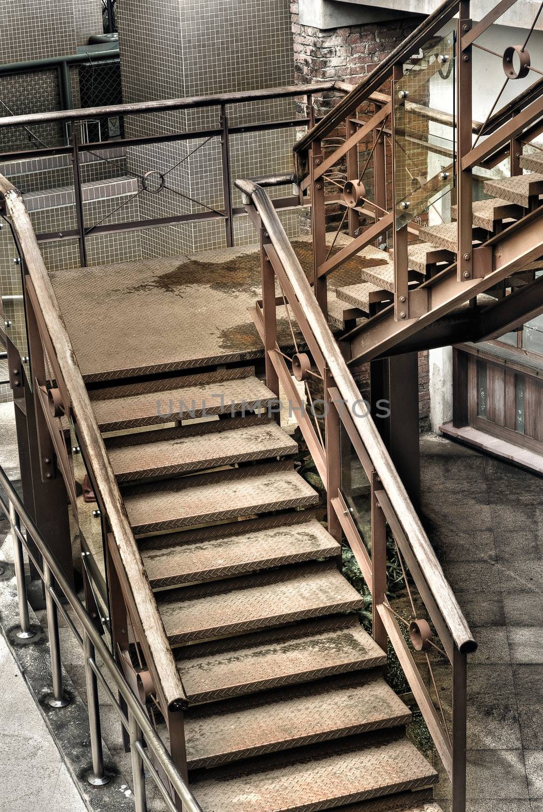 Grunge stair in old and dirty building of factory.
