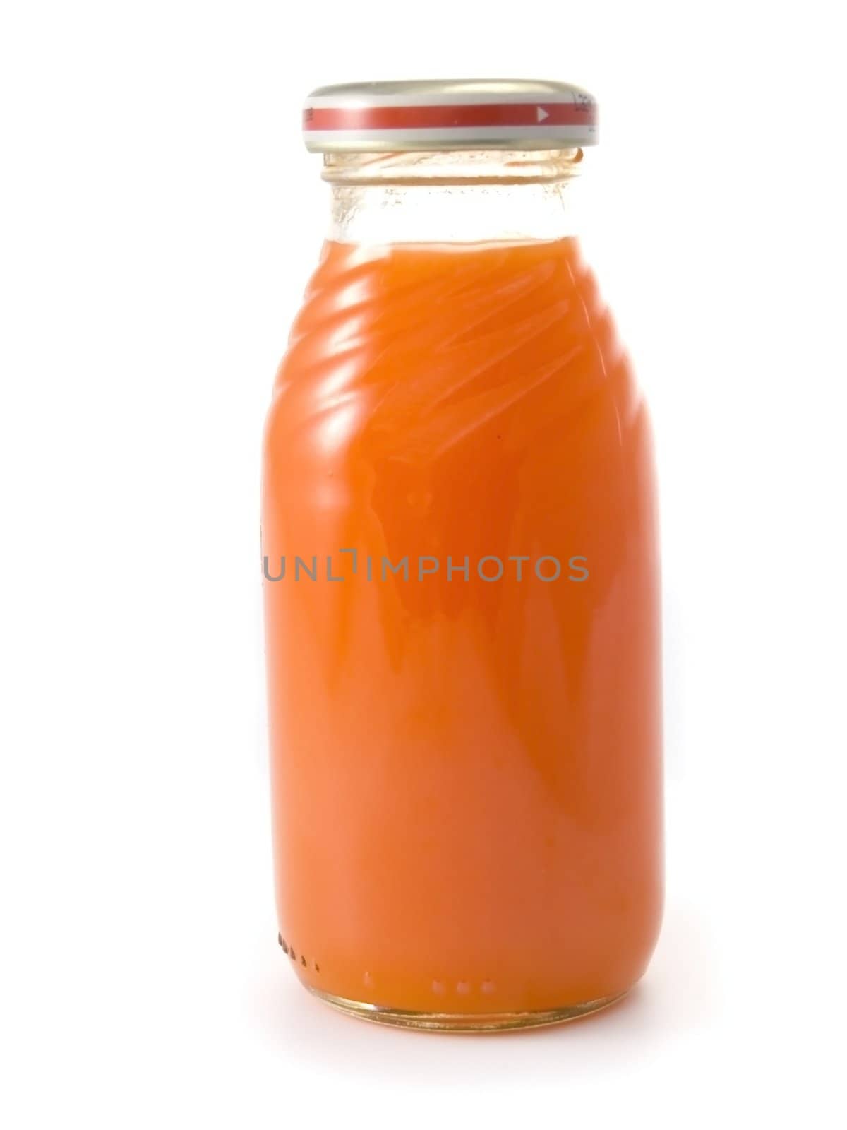 Close-up of baby food isolated on white background (carrot juice)