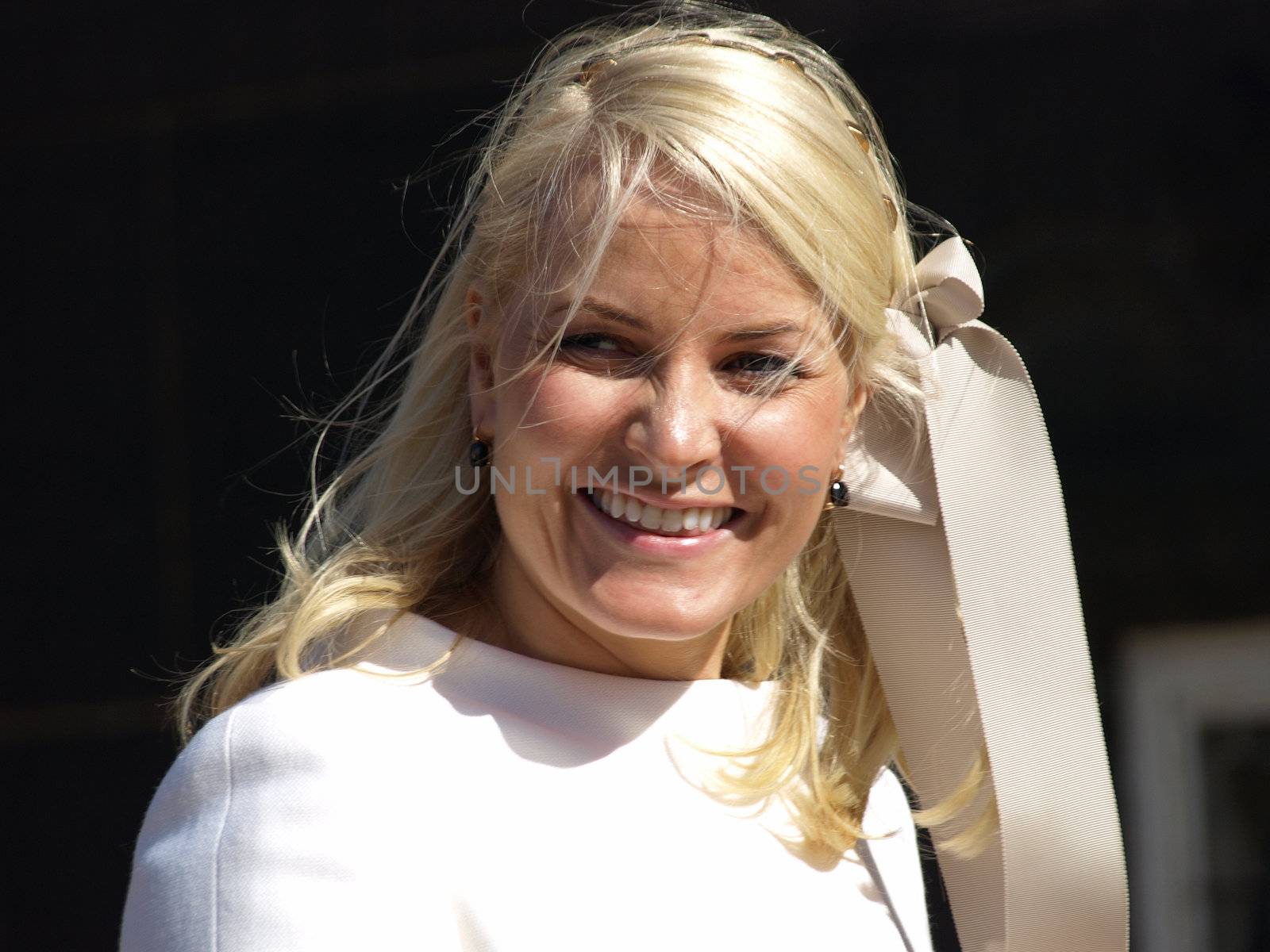 COPENHAGEN - APR 16: Denmark's Queen Margrethe celebrates her 70th birthday with other European Royals. The Queen rides an open carriage escorted by Hussars to Copenhagen City Hall on April 16, 2010.