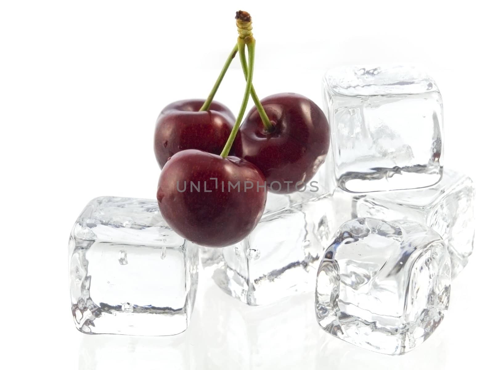 Close-up of sweet cherries isolated on white