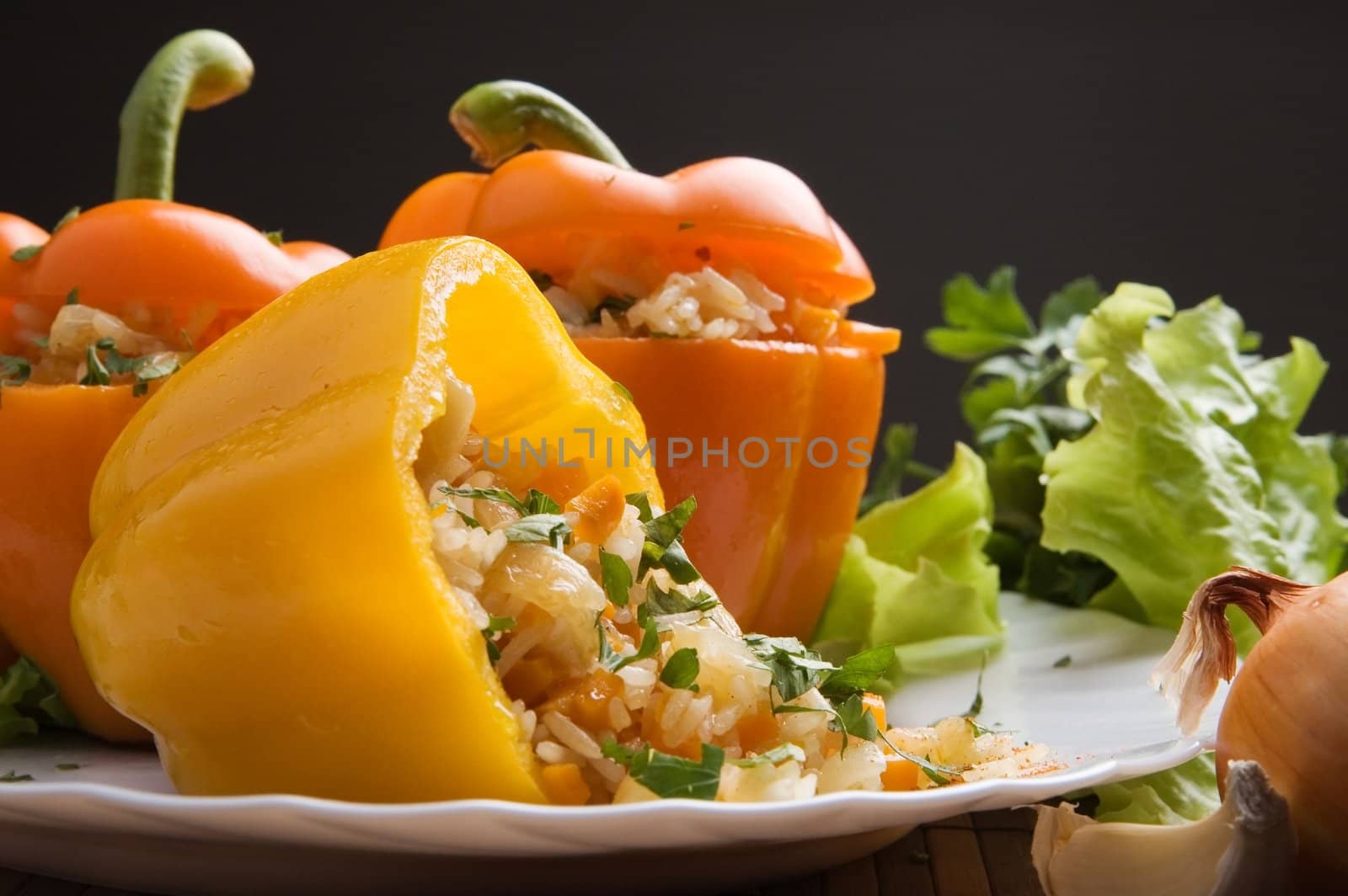 The sweet bulgarian pepper with vegetables and rice