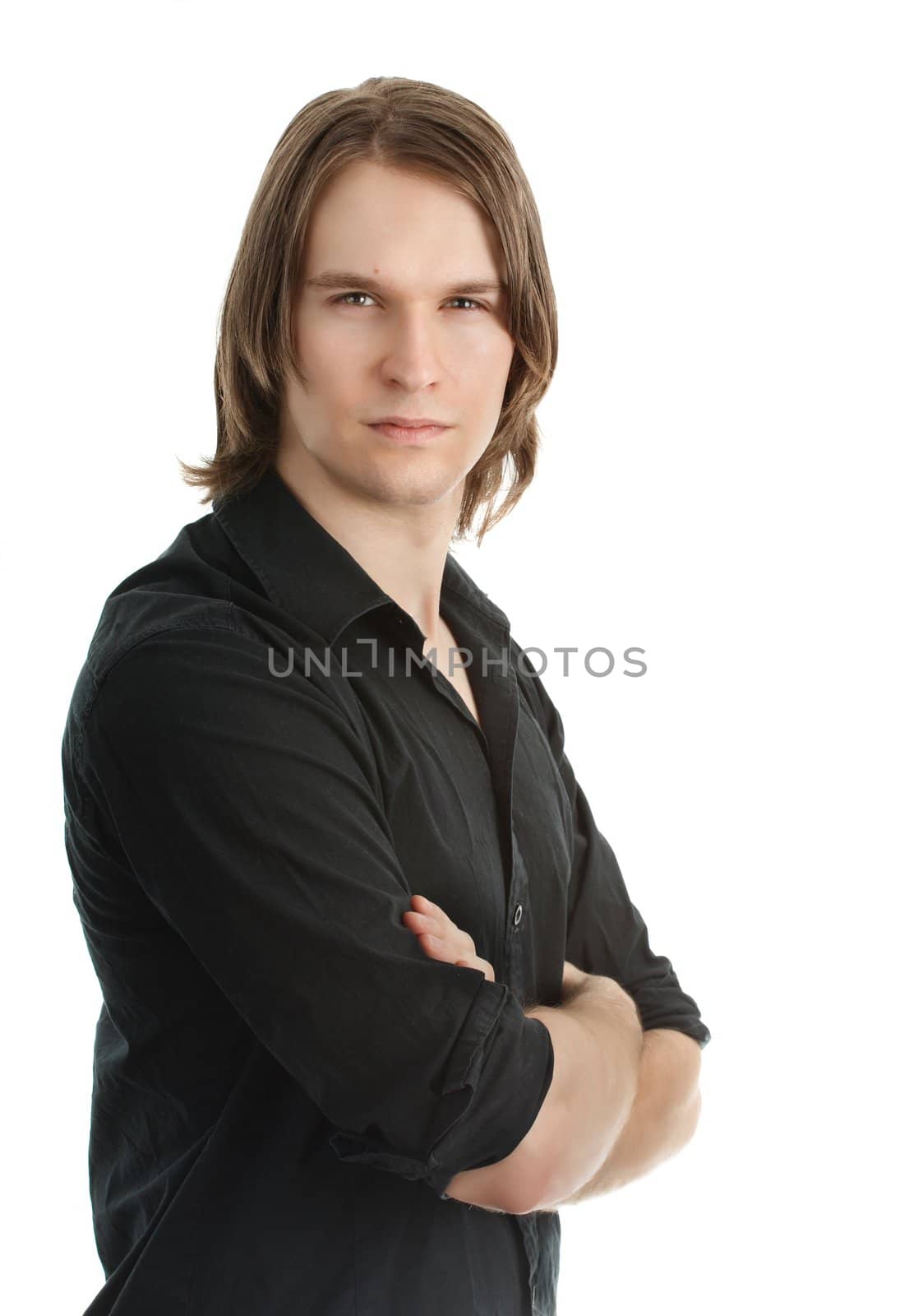 young serious man arm crossed, white background