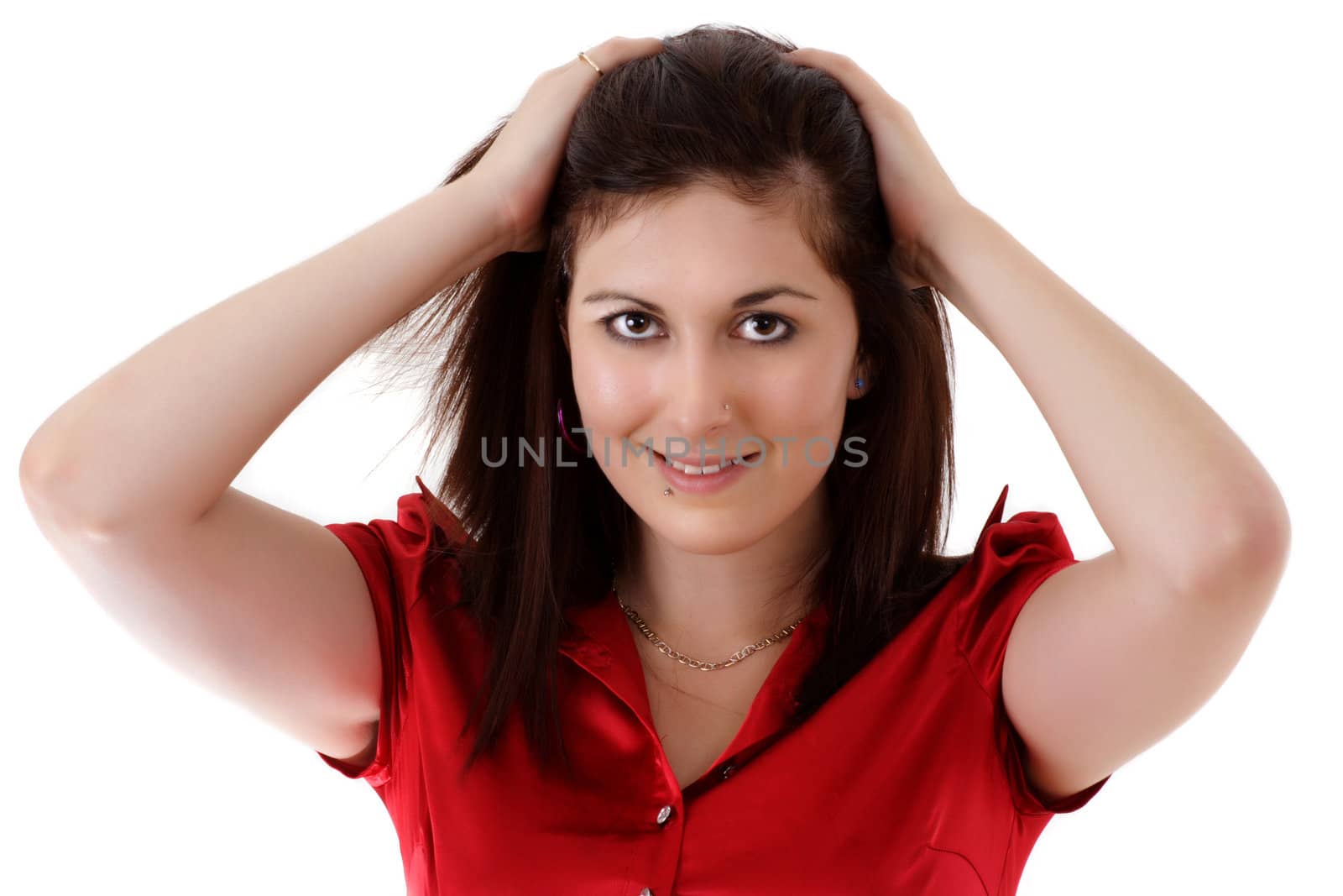 woman with her hands on her hair