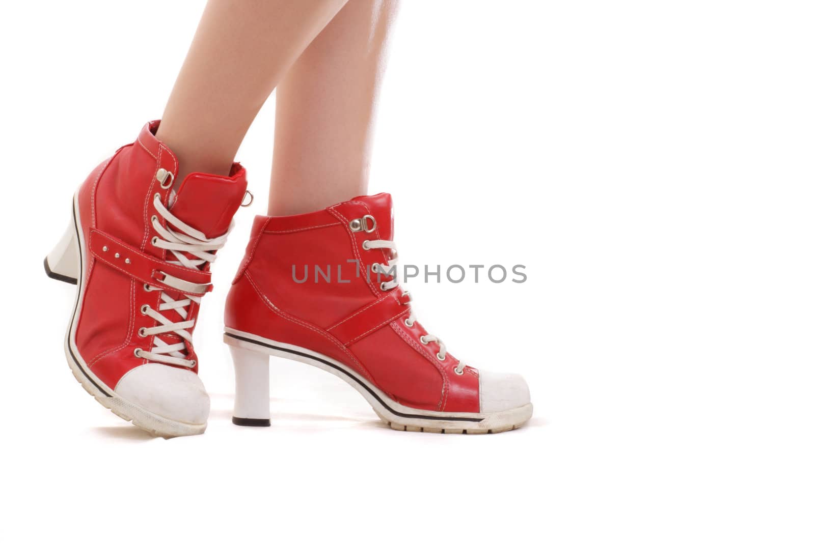 woman leg with red shoes, isolated on white