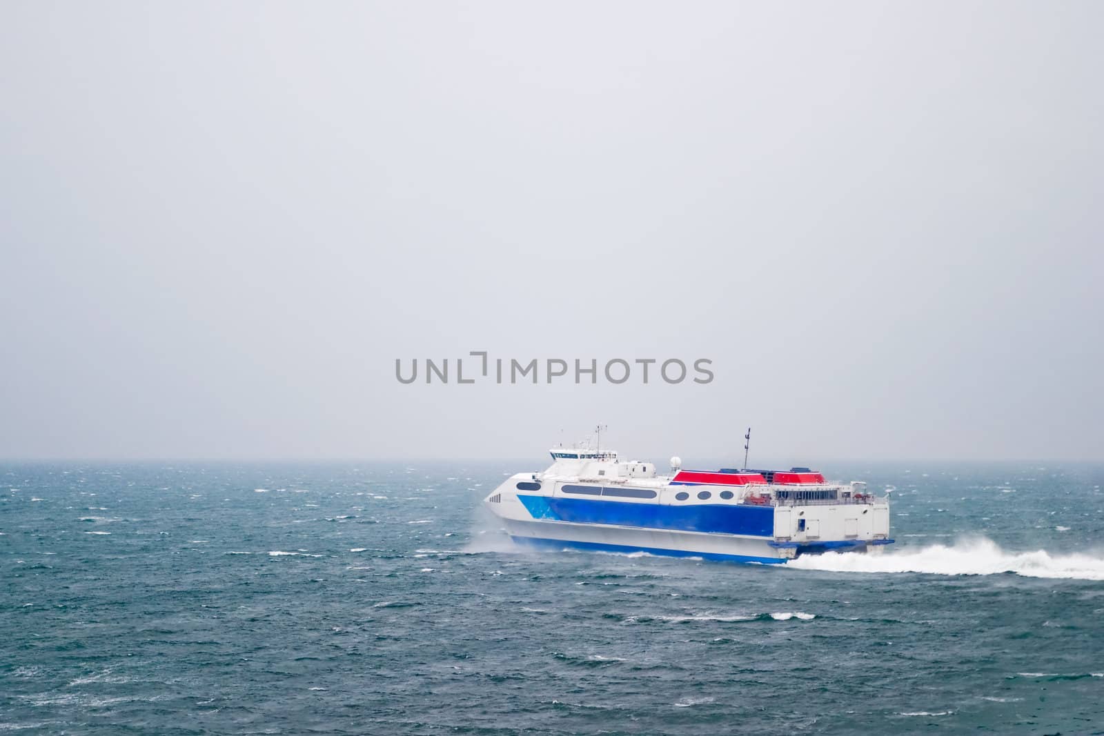 A speed ferry catamaran on the Ocean