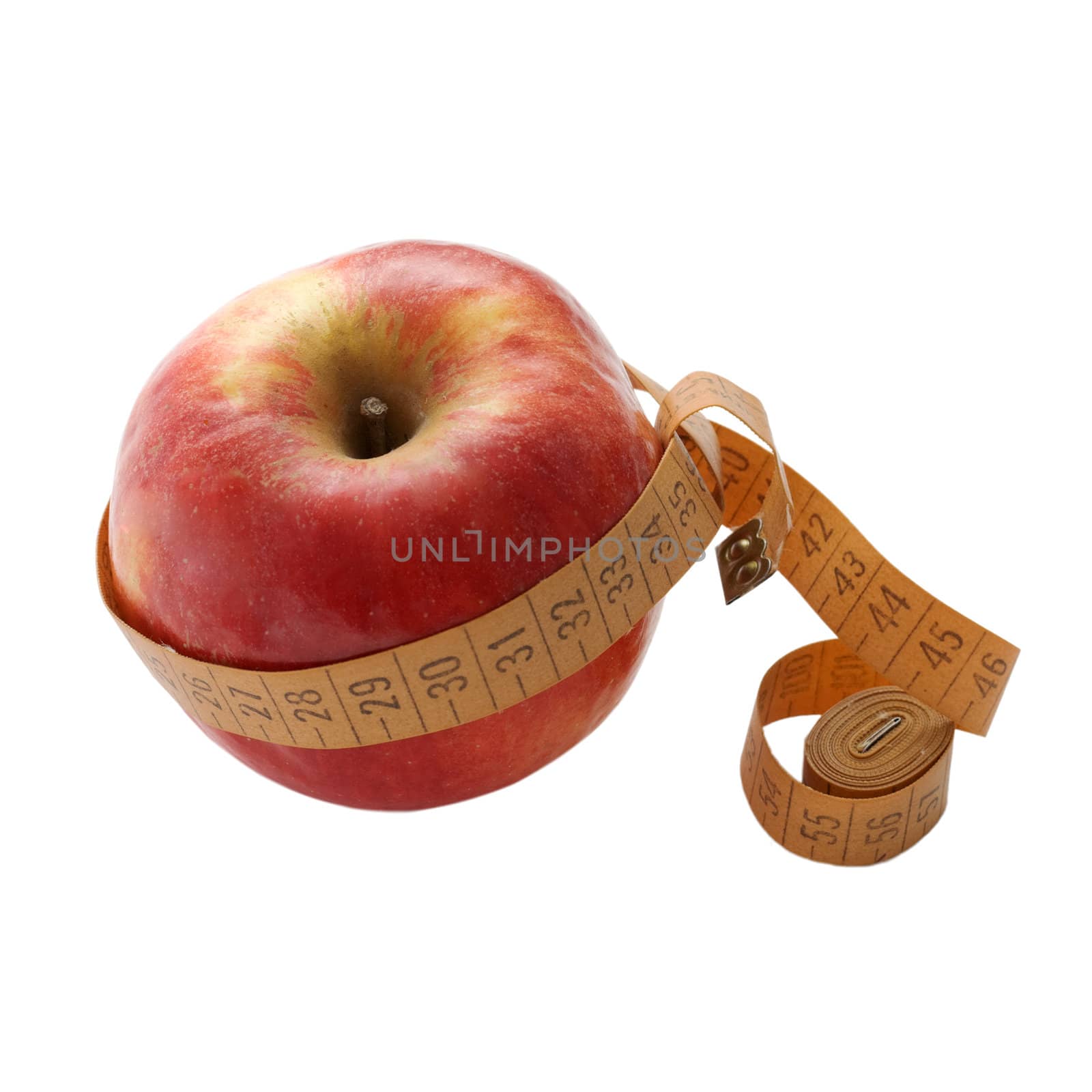 Red apple with measuring tape on the white background