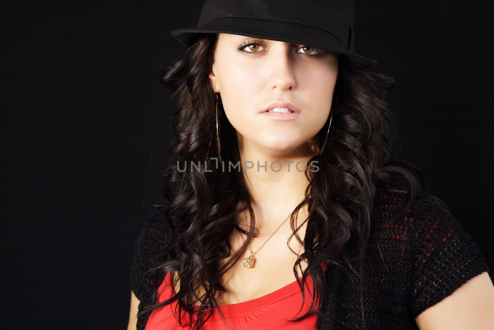 portrait of a young pretty woman with a hat