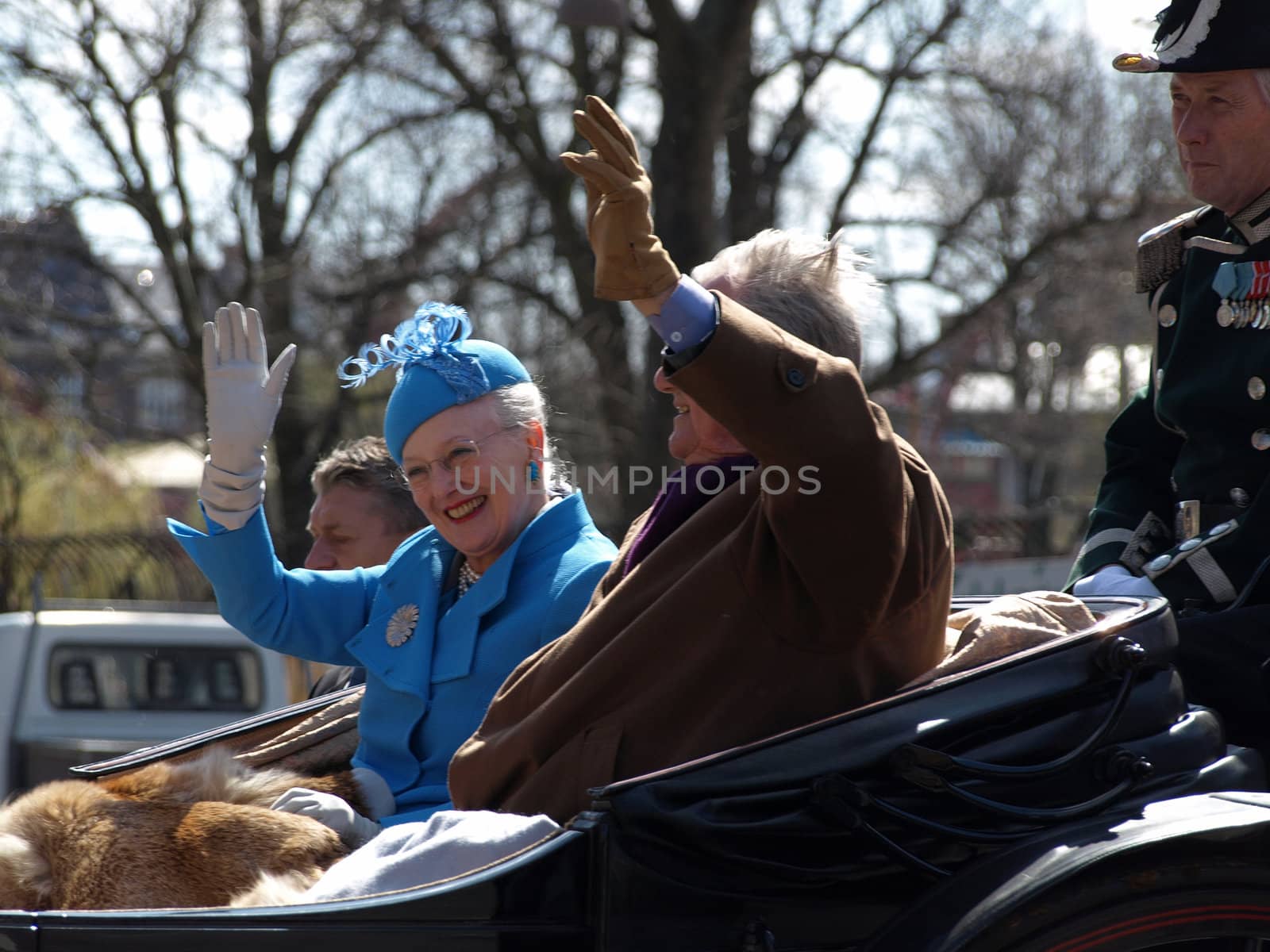 COPENHAGEN - APR 16: Denmark's Queen Margrethe celebrates her 70th birthday with other European Royals. The Queen rides an open carriage escorted by Hussars to Copenhagen City Hall on April 16, 2010.   