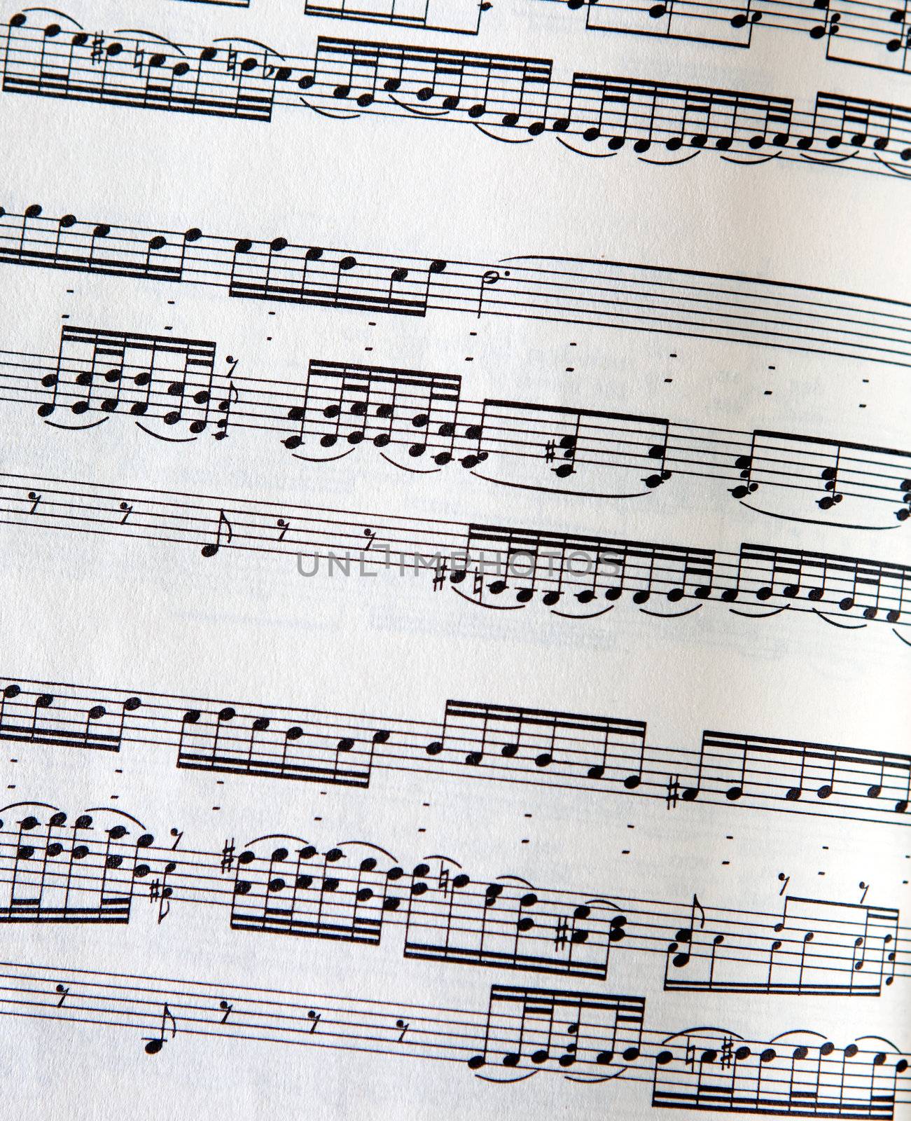 A page of music with detailed paper texture