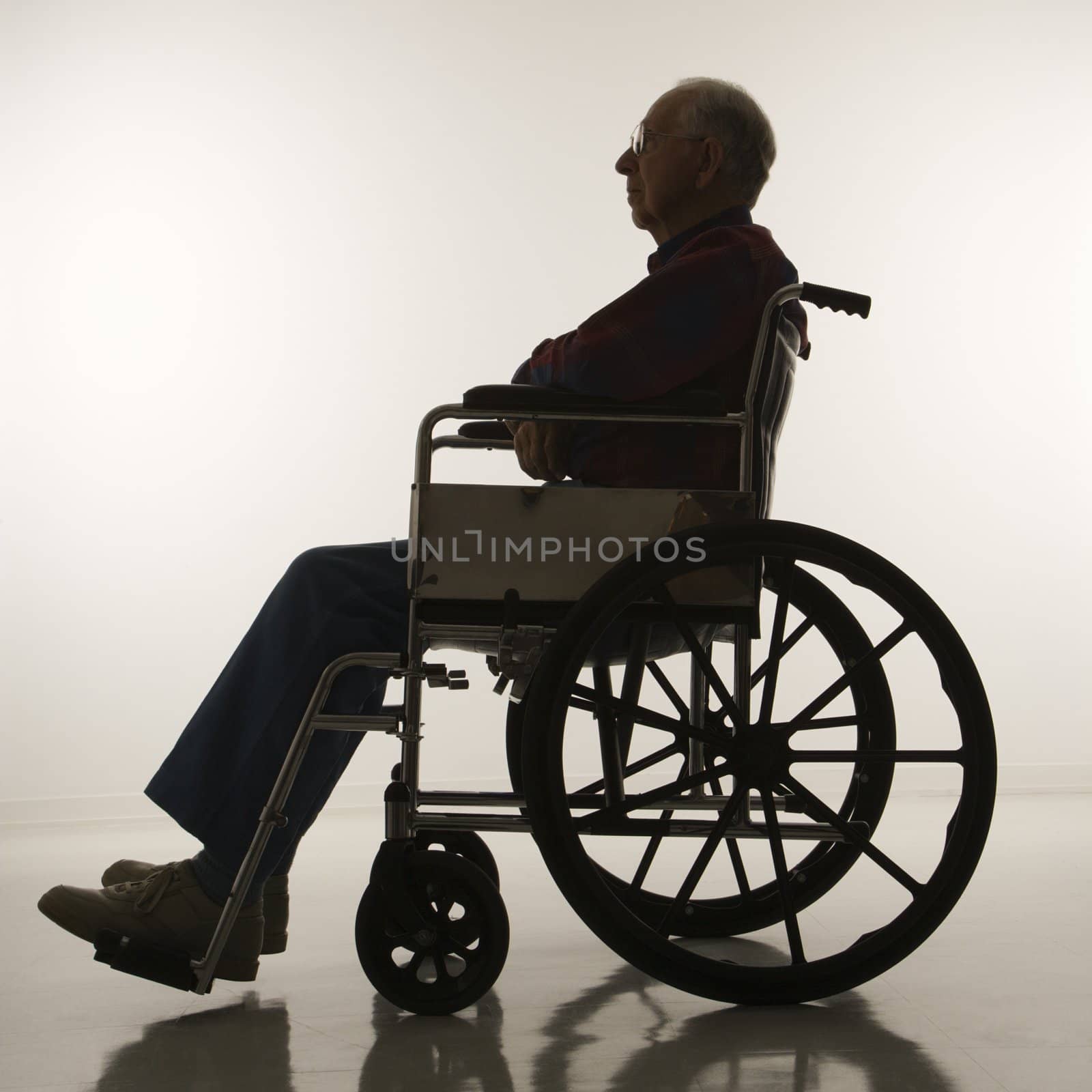 Man in wheelchair. by iofoto