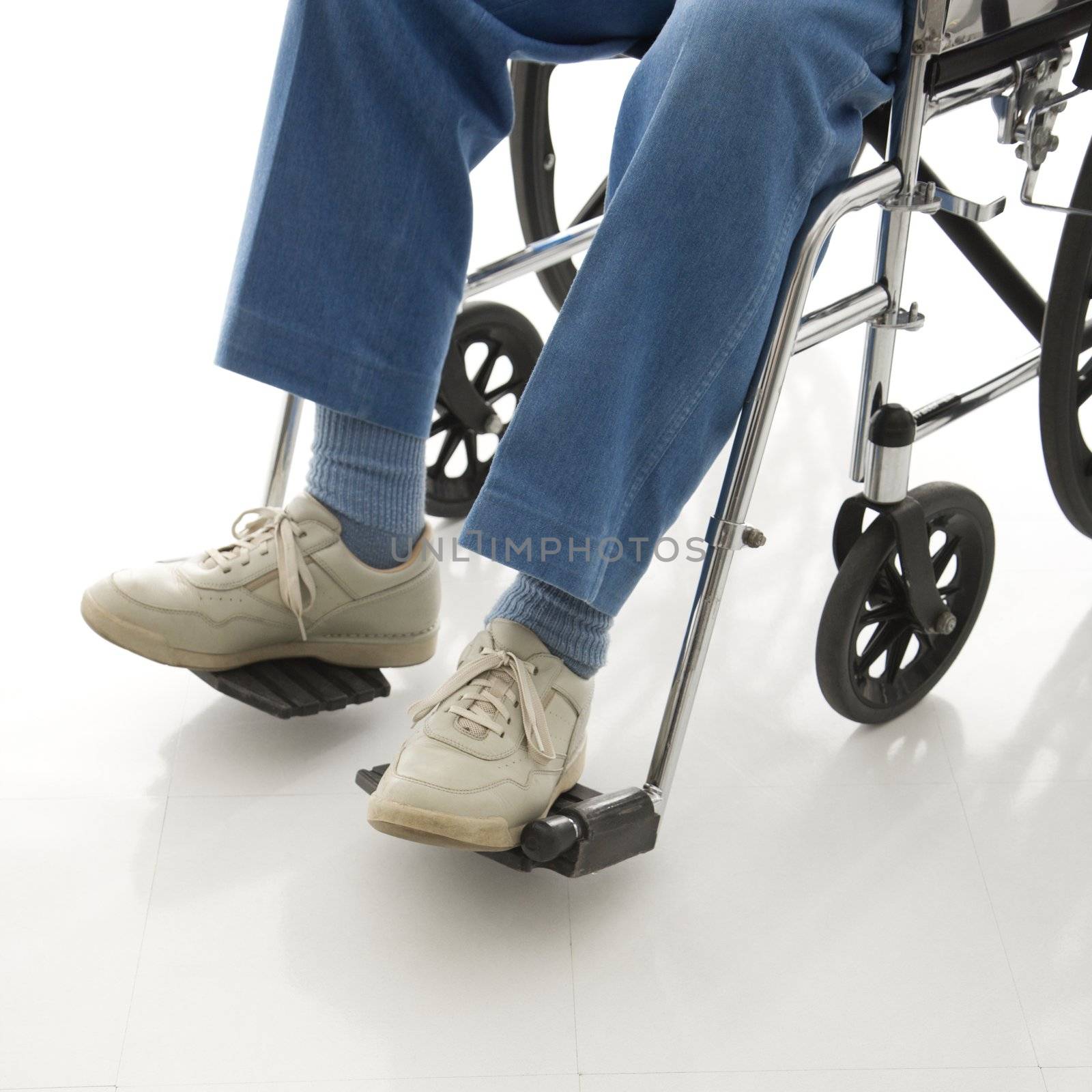 Man a wheelchair. by iofoto