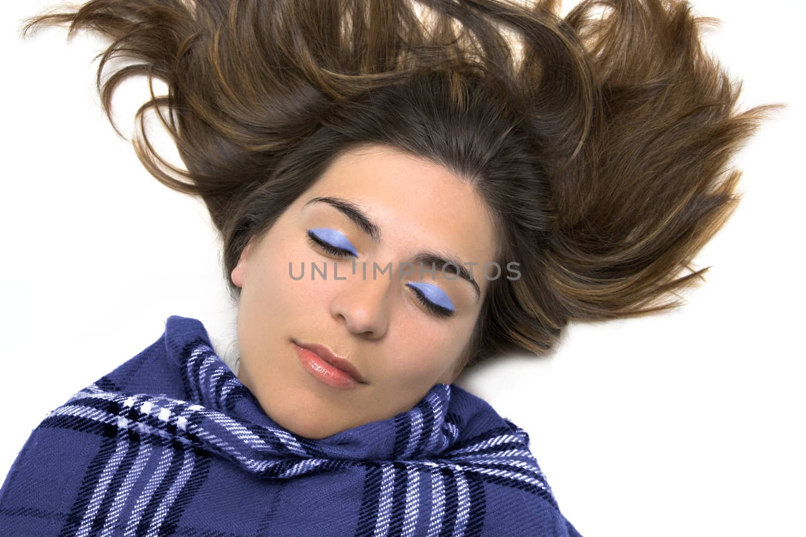 Young woman sleeping with a blue make-up