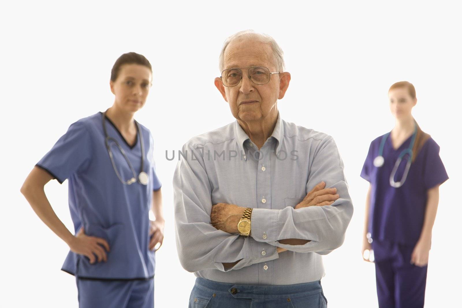 Man with medical workers. by iofoto