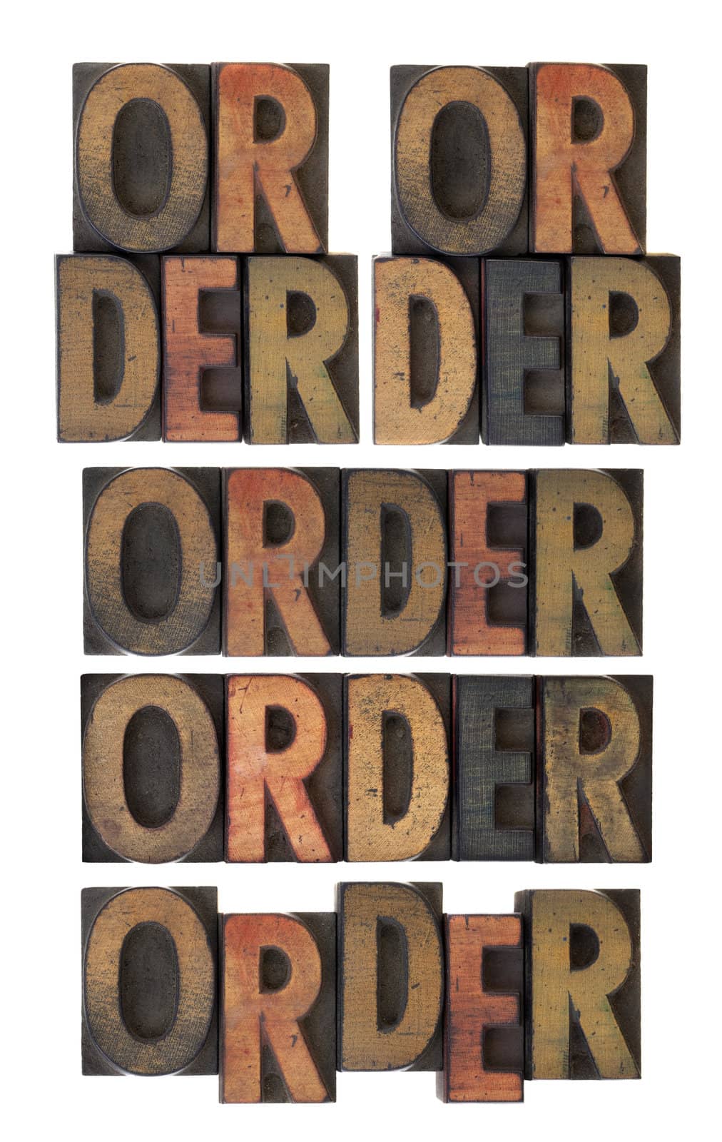 several layout version of word order, vintage letterpress wood type scratched and stained by ink, isolated on white