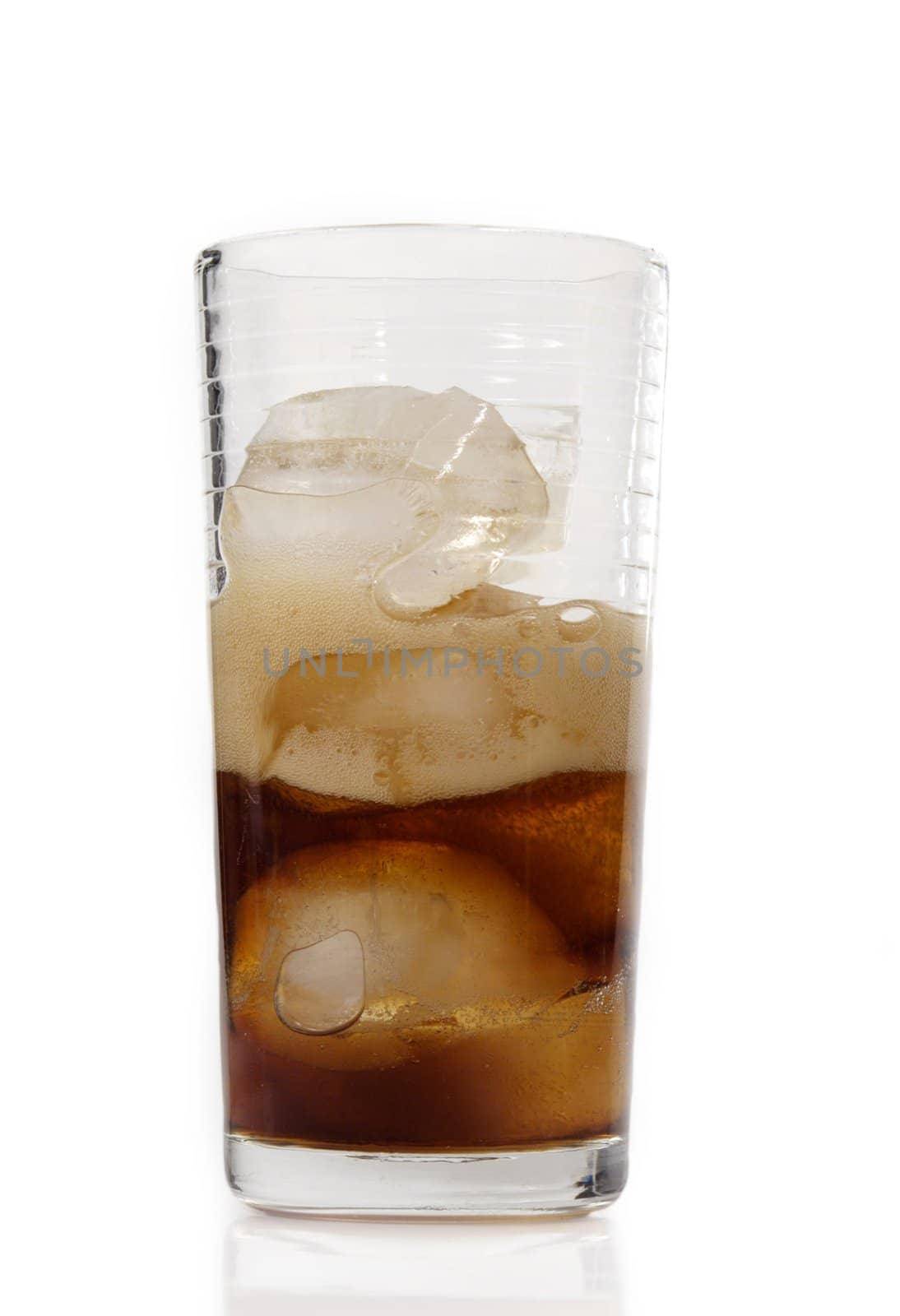 glass of cola with ice cube